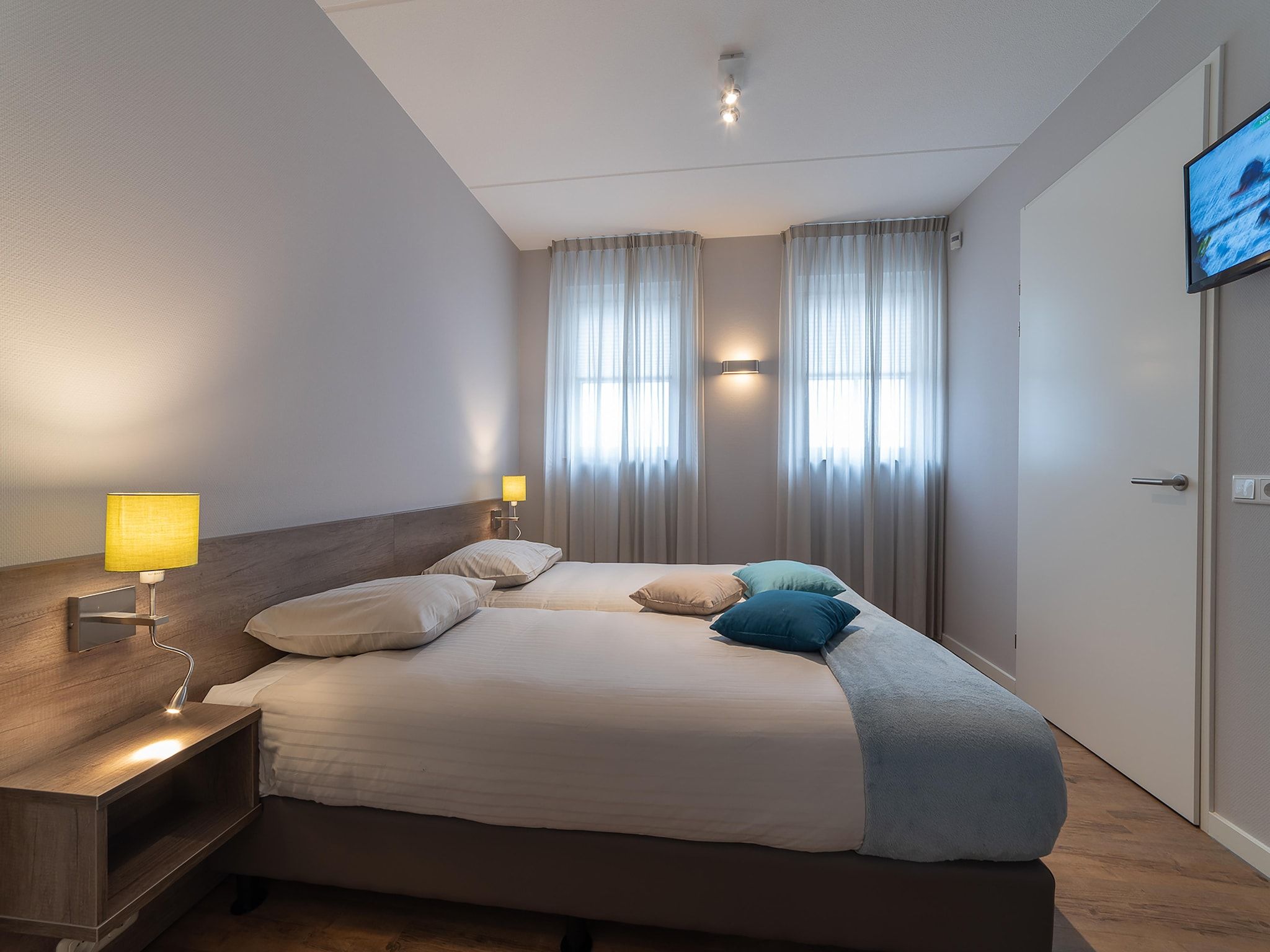 Een slaapkamer van Zeeuwse Pracht Kindervilla in Colijnsplaat