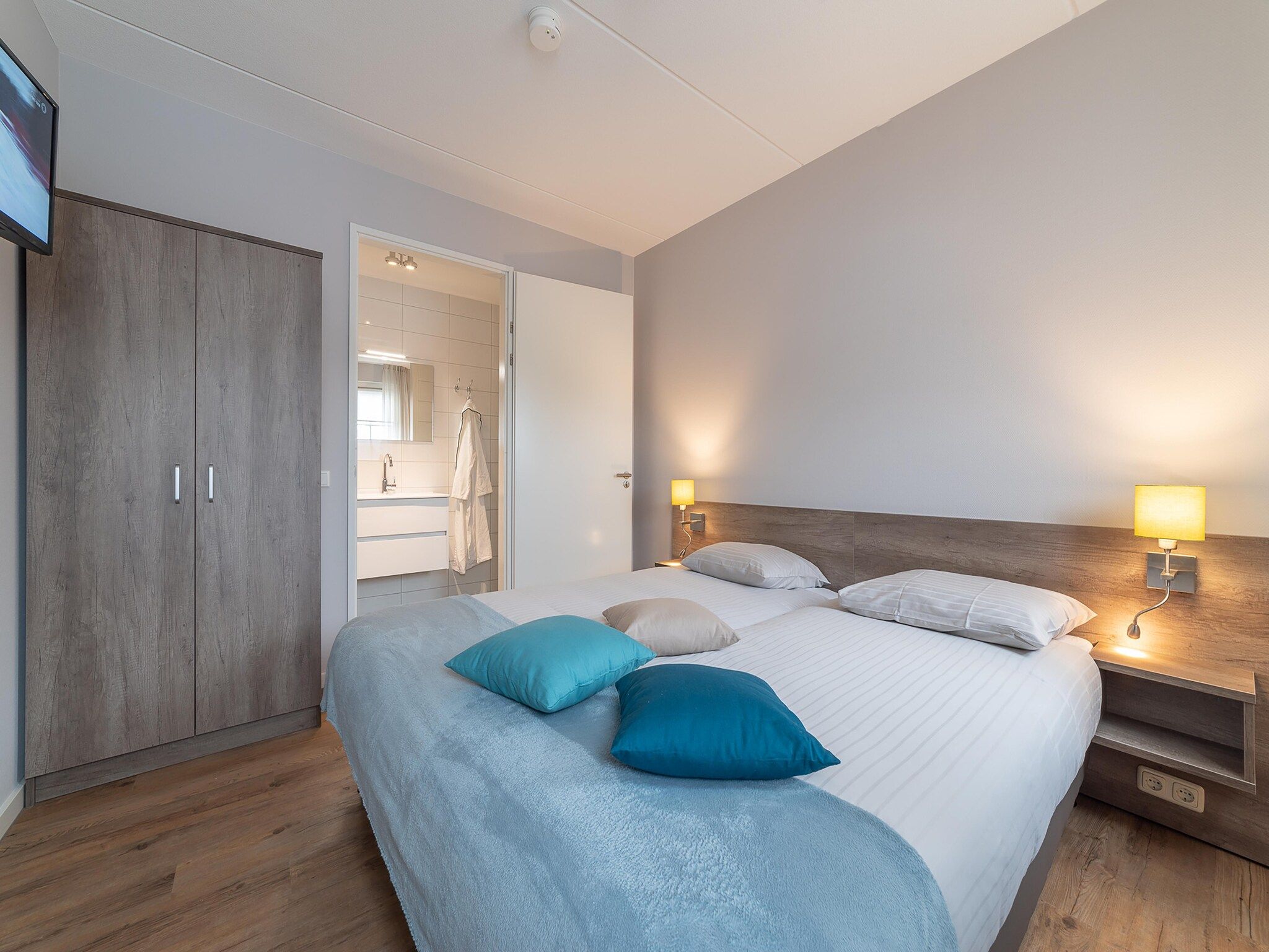 Een slaapkamer van Zeeuwse Pracht Kindervilla in Colijnsplaat