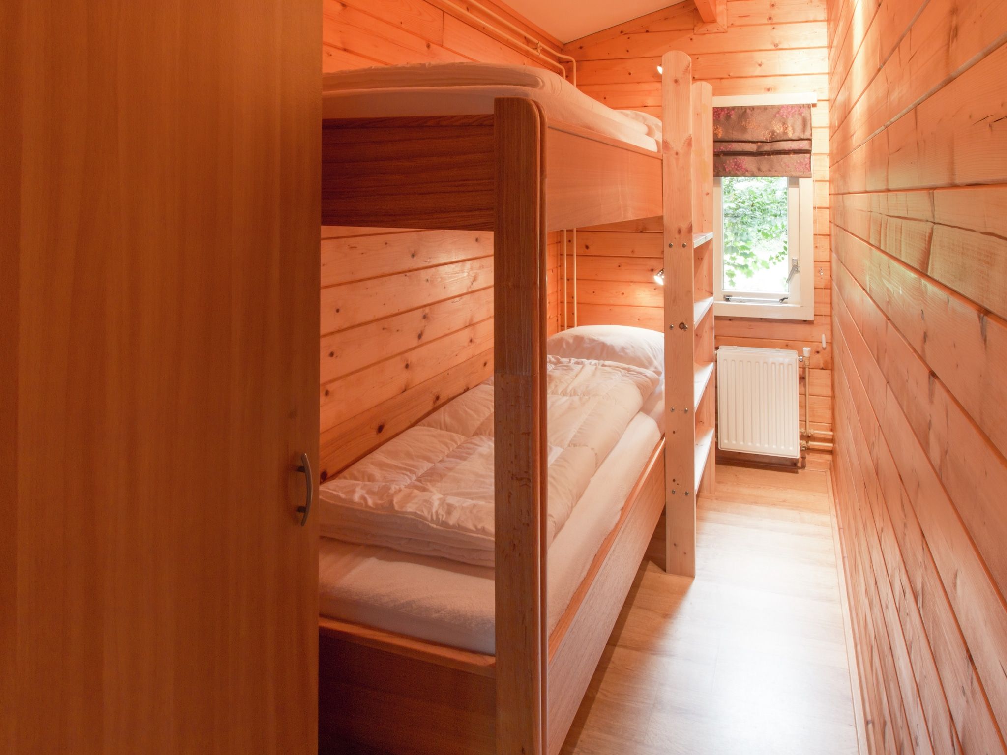 Een slaapkamer van Chaletpark Kuiperberg 4 in Ootmarsum