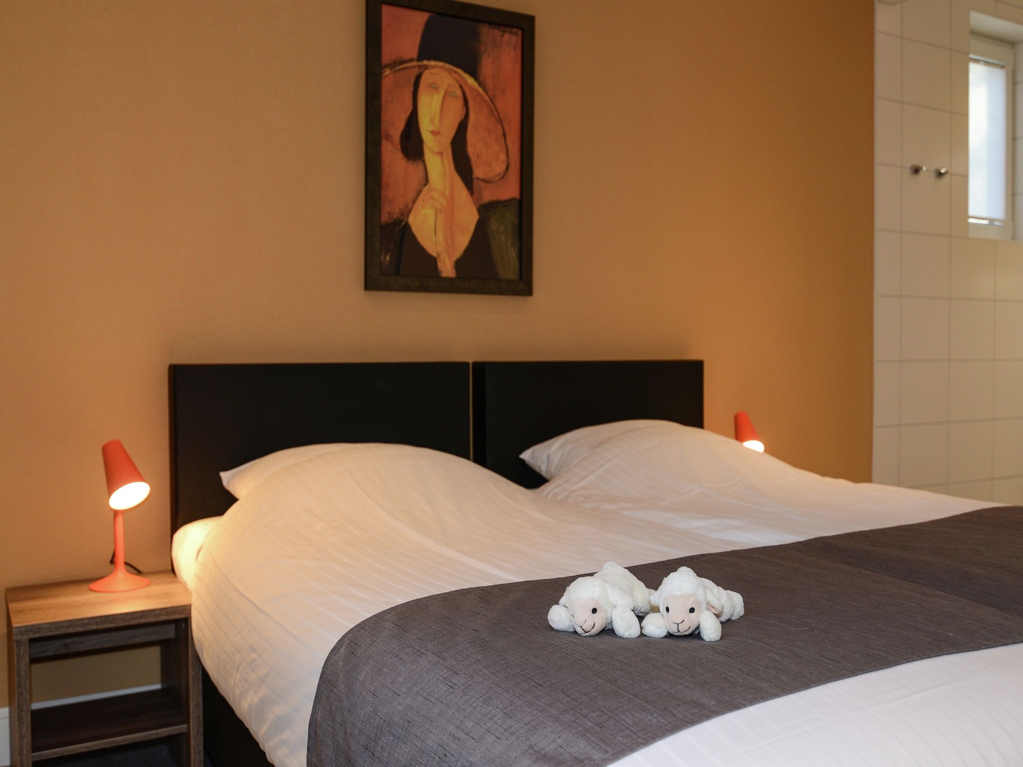 Een slaapkamer van Tempelier 39 in Den Burg-Texel