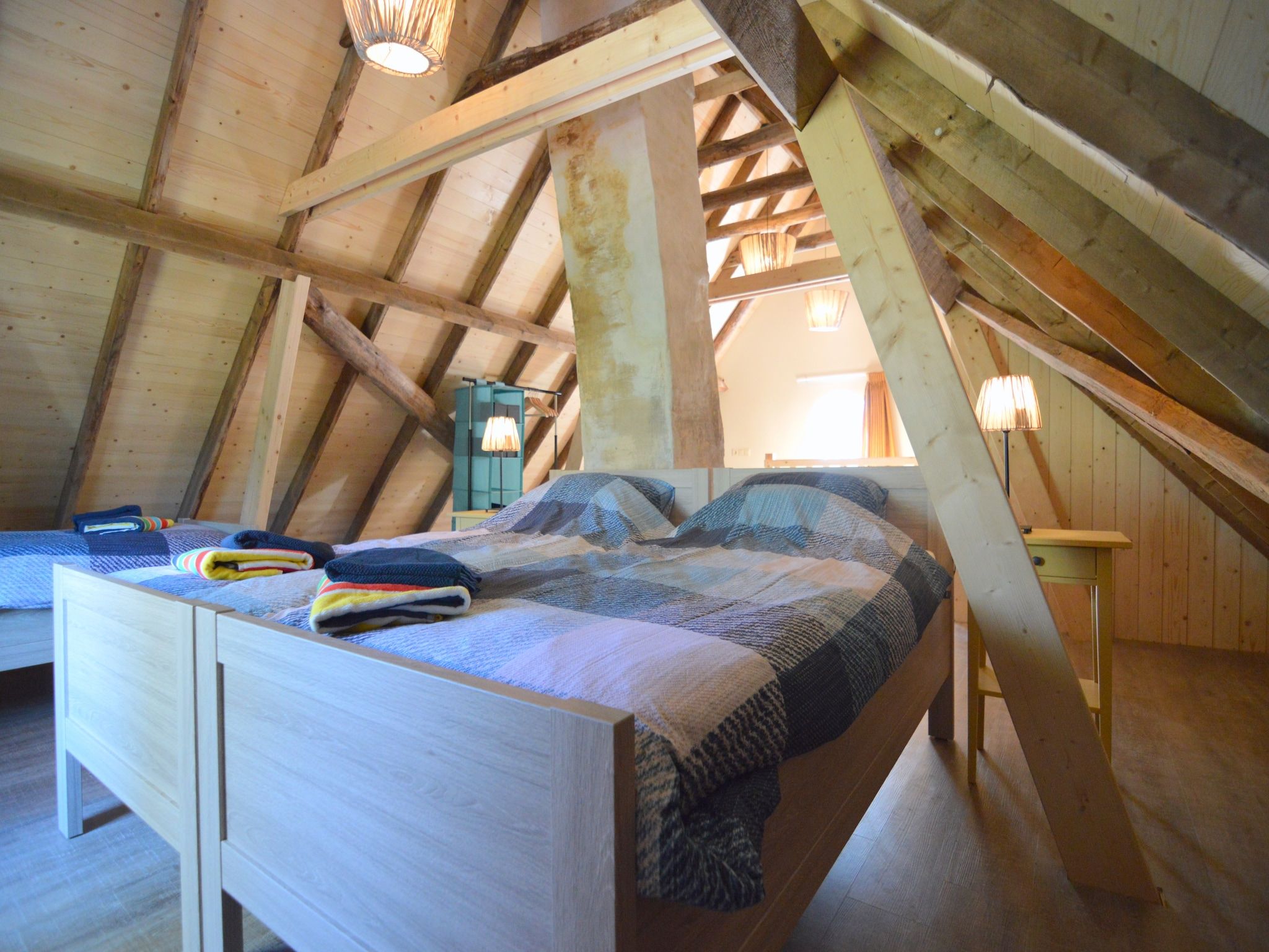 Een slaapkamer van Bakhuus in Geesteren