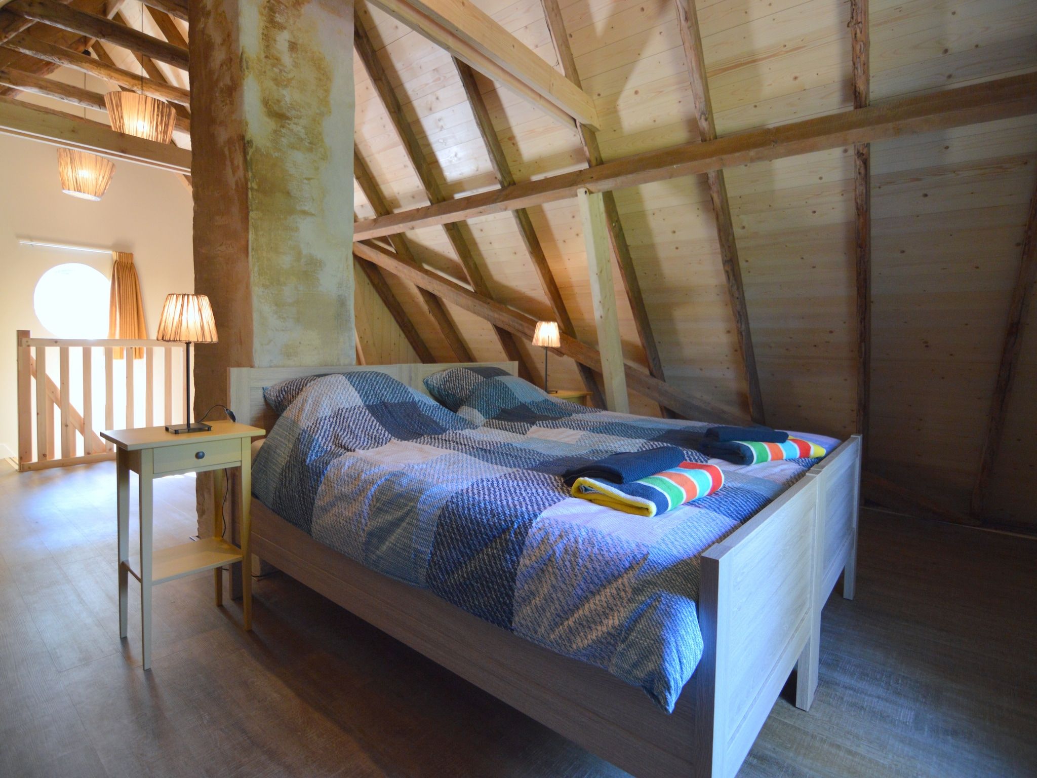 Een slaapkamer van Bakhuus in Geesteren