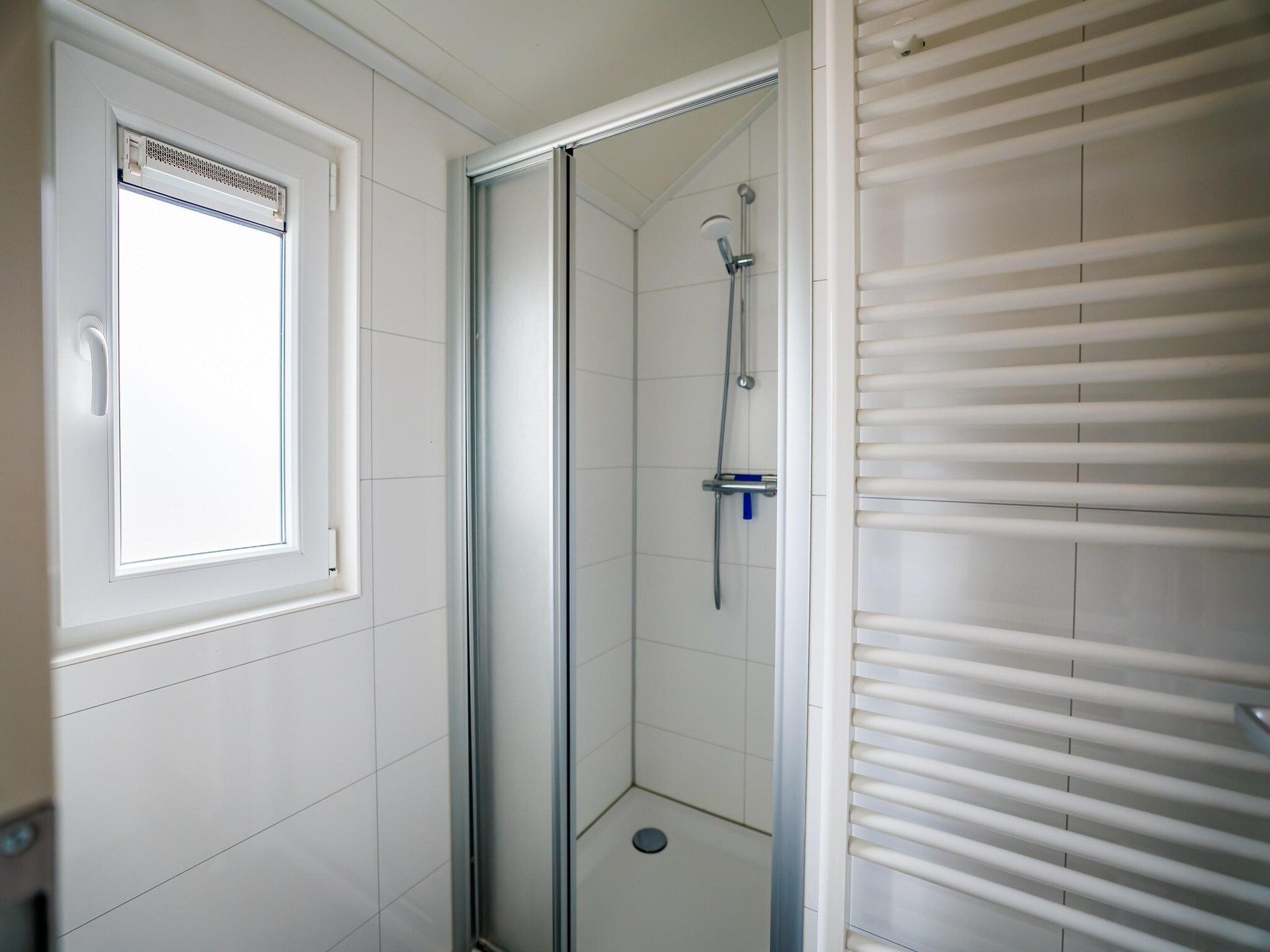 De badkamer van Vakantiepark Eiland van Maurik 2 in Maurik