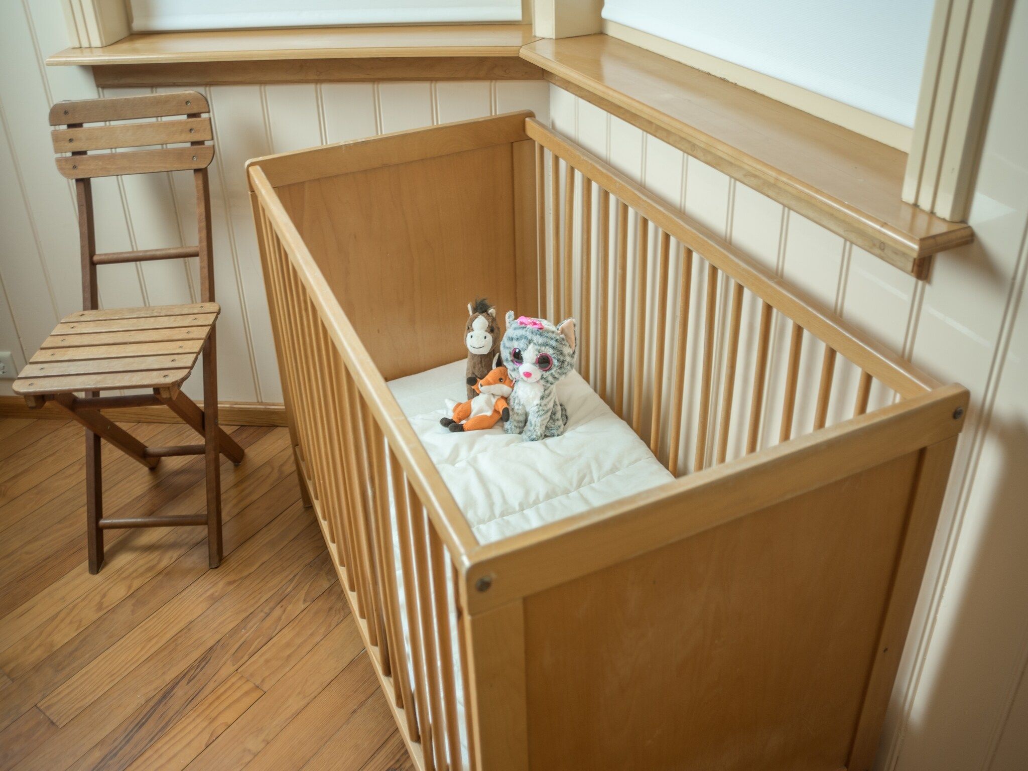 Een slaapkamer van De Kerkuil in De Cocksdorp-Texel