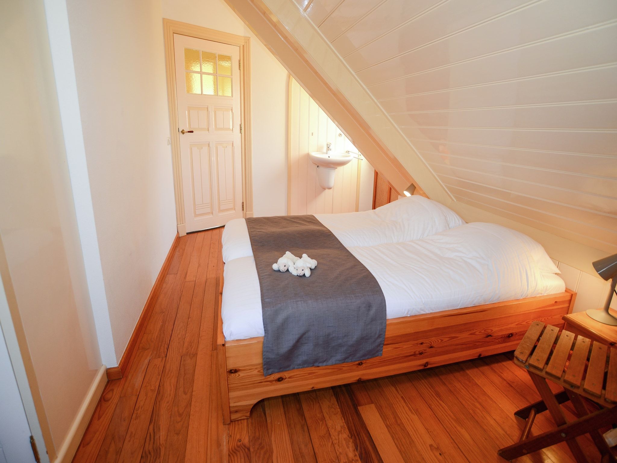 Een slaapkamer van De Ransuil in De Cocksdorp-Texel