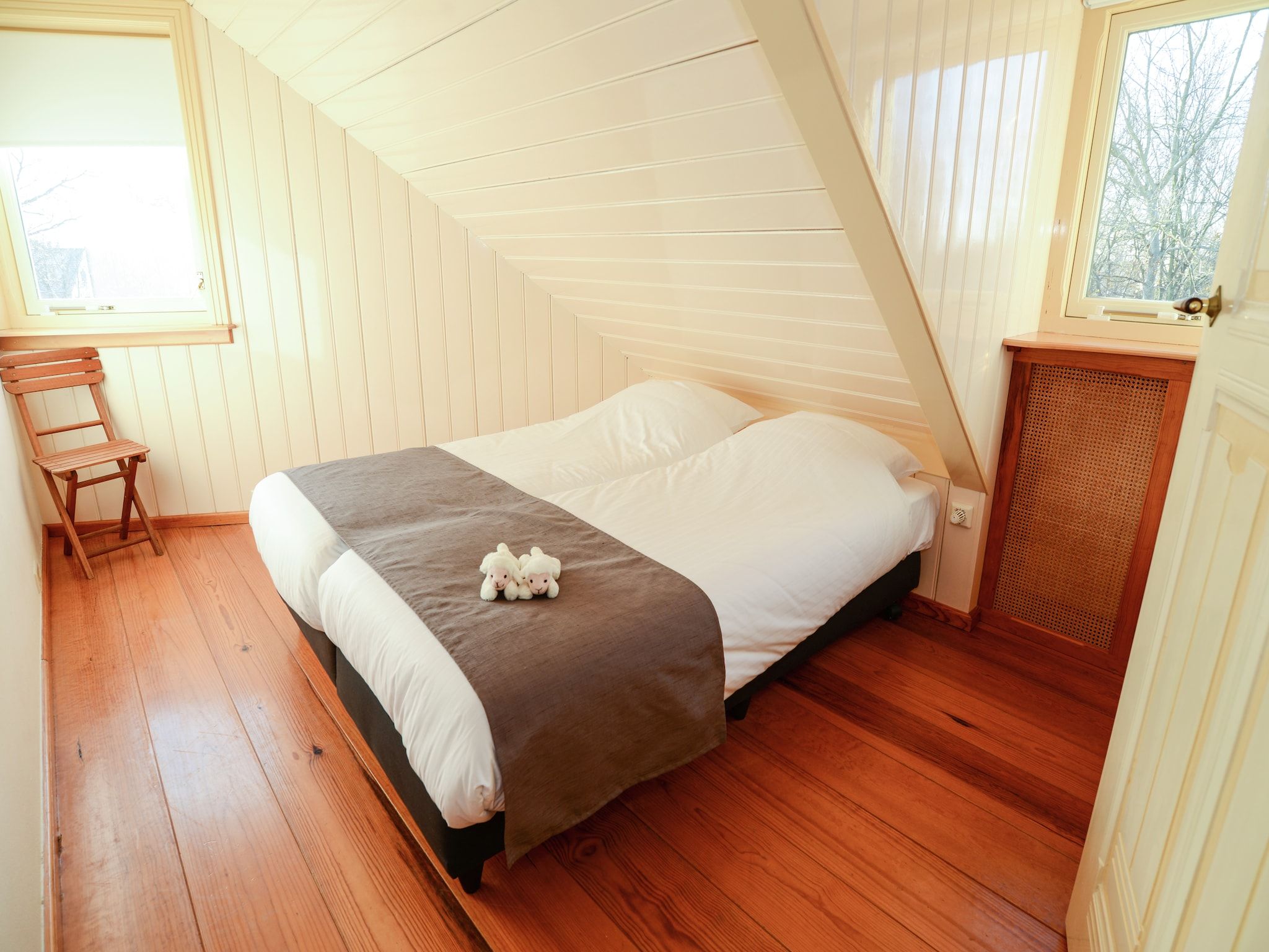 Een slaapkamer van De Ransuil in De Cocksdorp-Texel