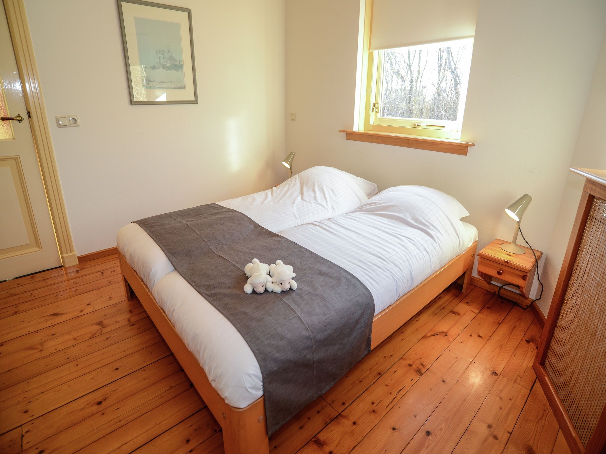 Een slaapkamer van De Ransuil in De Cocksdorp-Texel