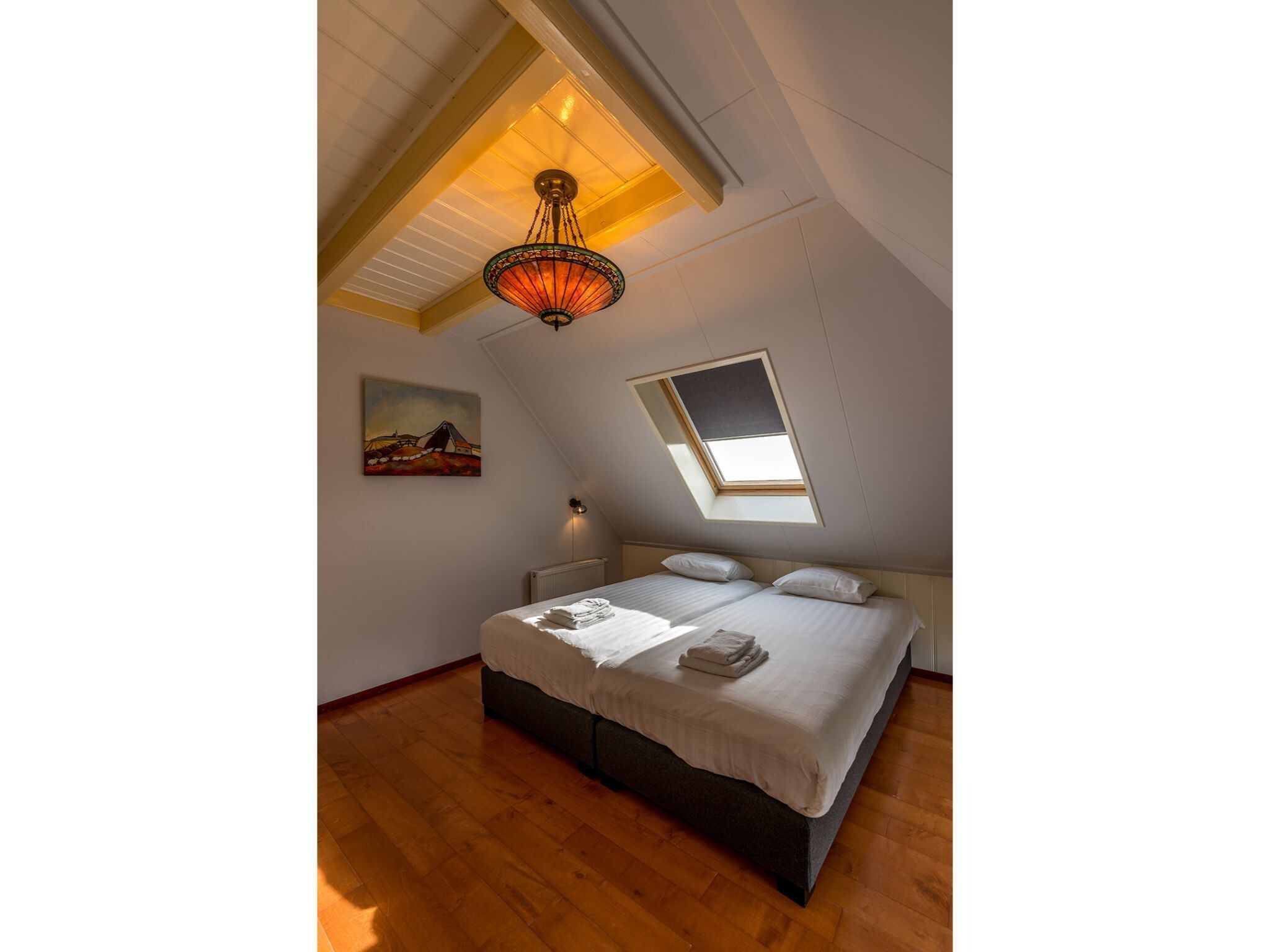 Een slaapkamer van Florijn 2 in Oost-Texel