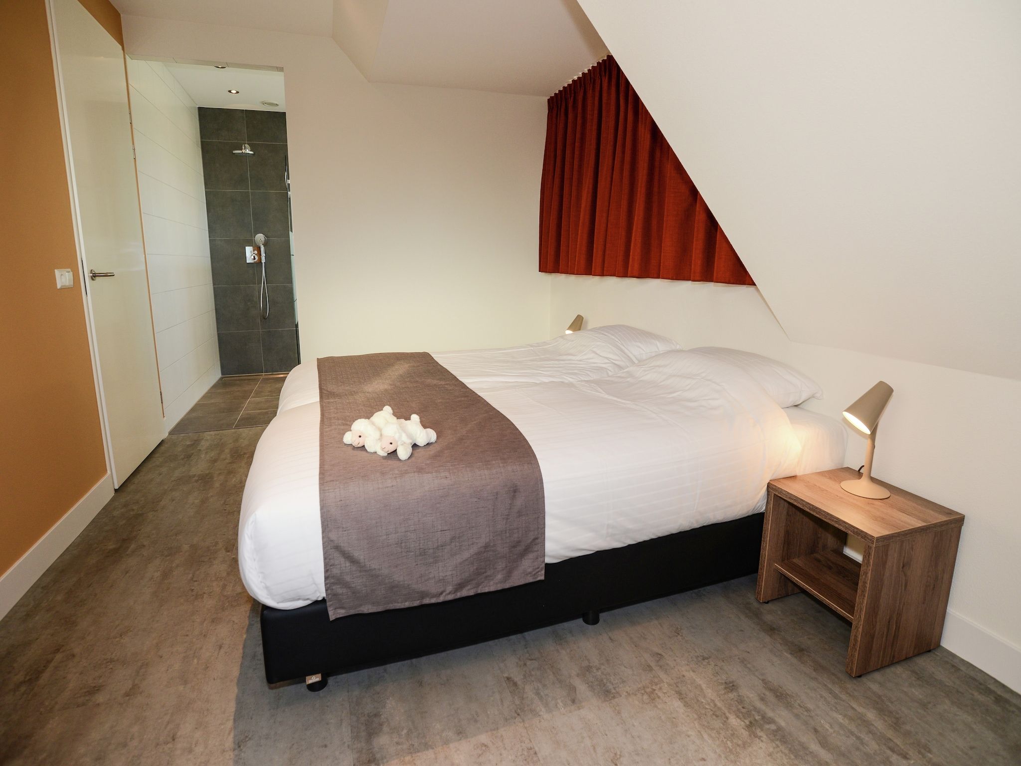 Een slaapkamer van Villa Hoogelandt 70 in De Koog-Texel