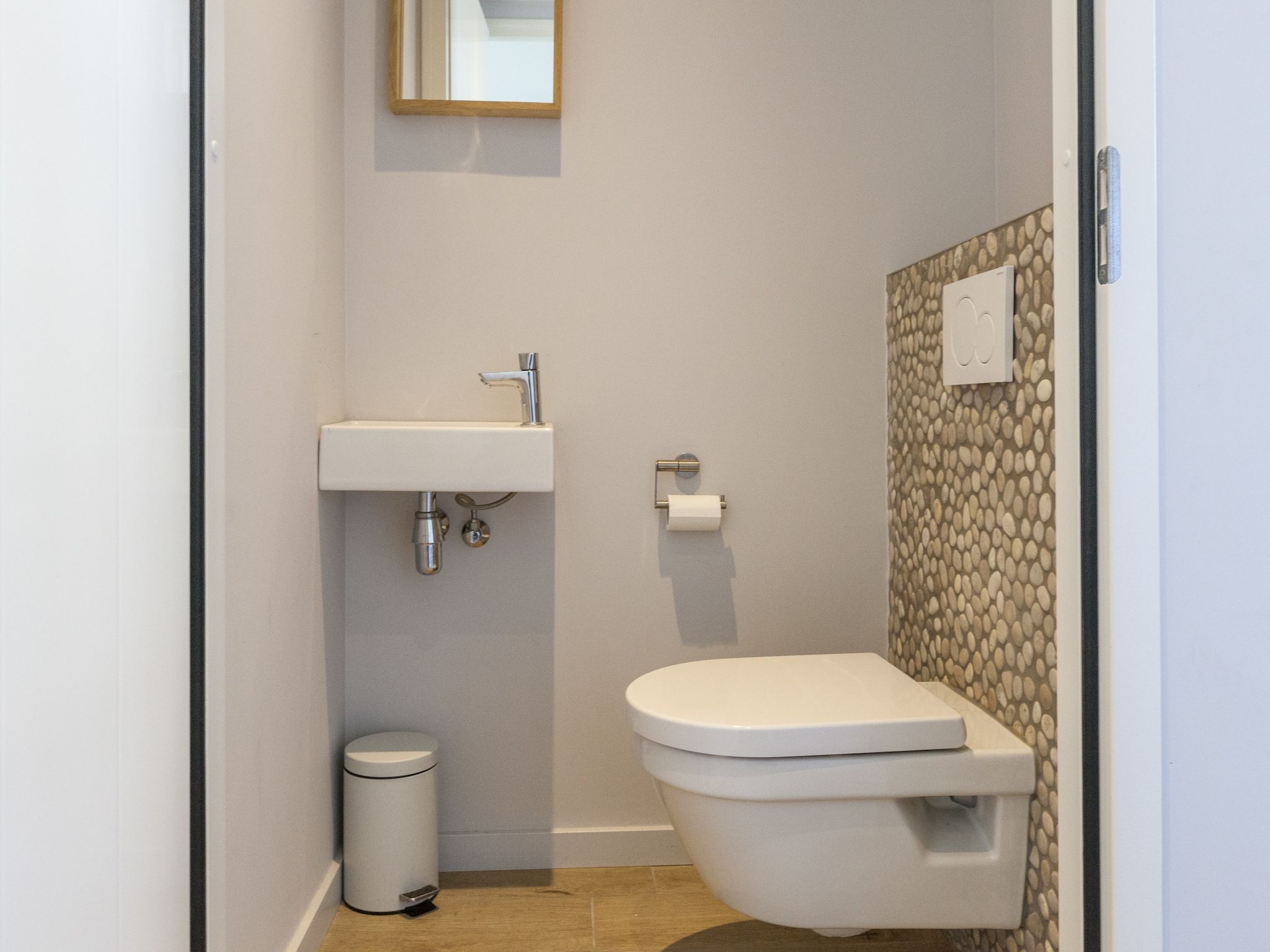 De badkamer van Villa Zandduin in Cadzand