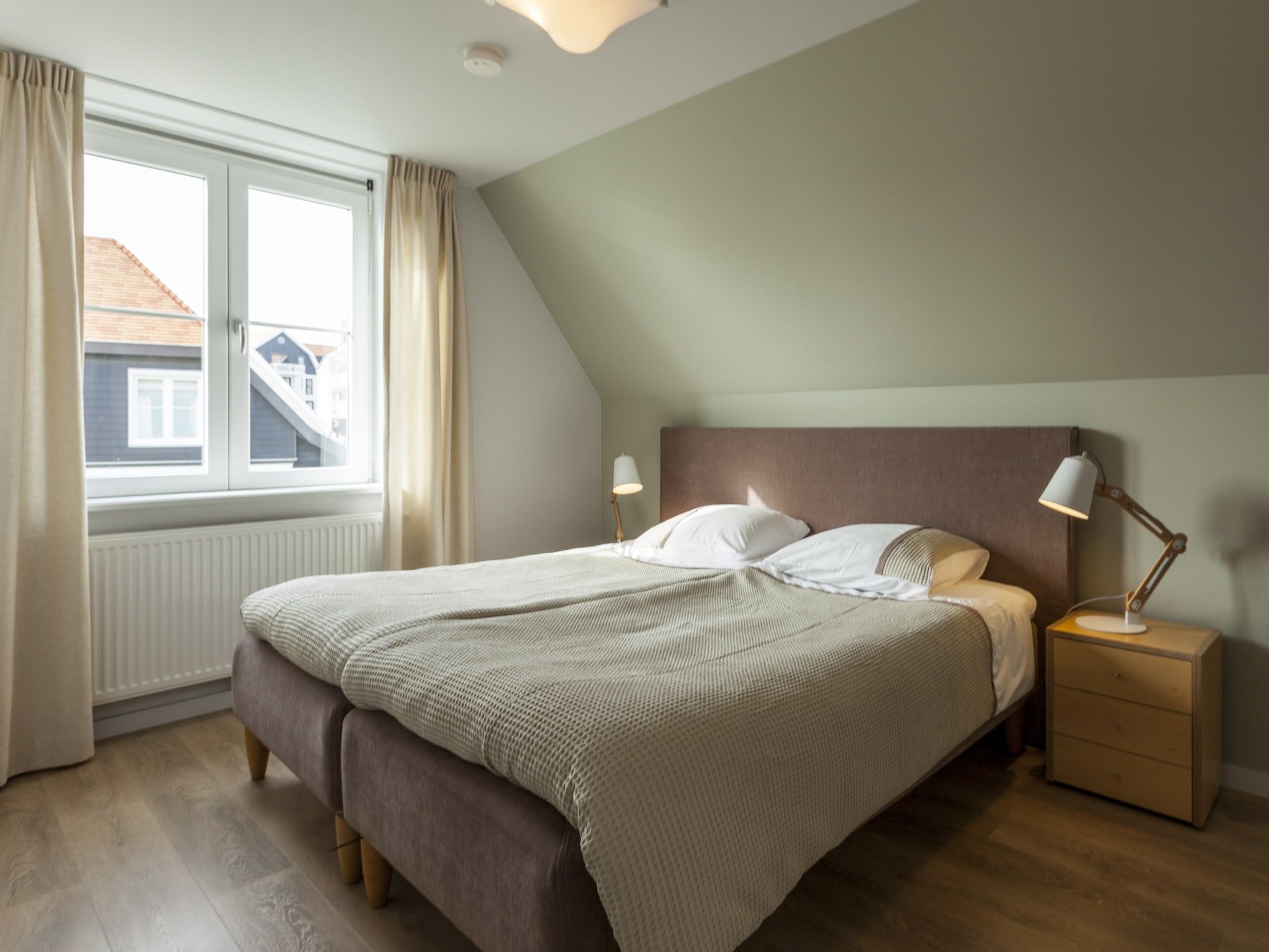 Een slaapkamer van Villa Zandduin in Cadzand