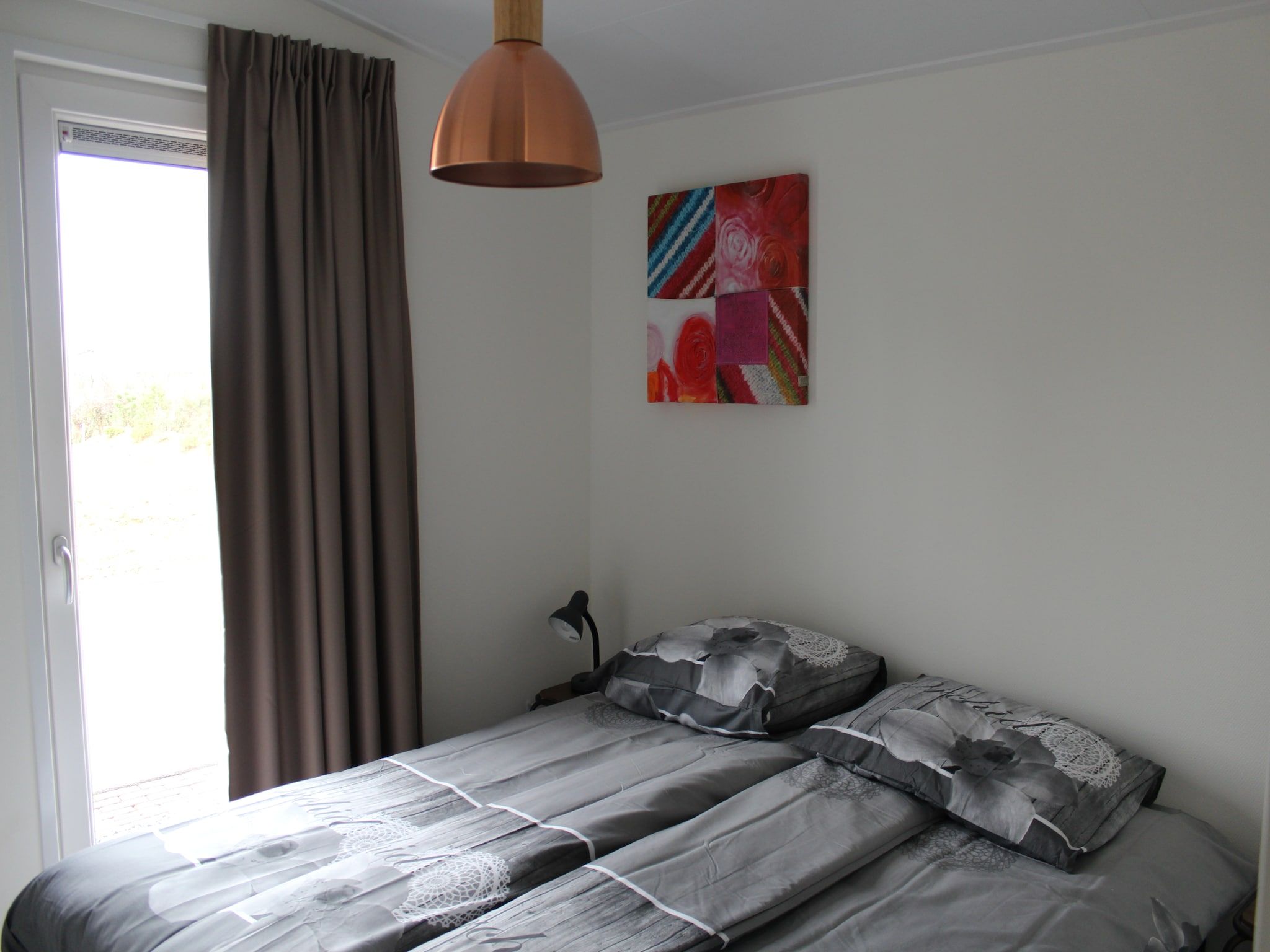 Een slaapkamer van Resort Mooi Bemelen 3 in Bemelen