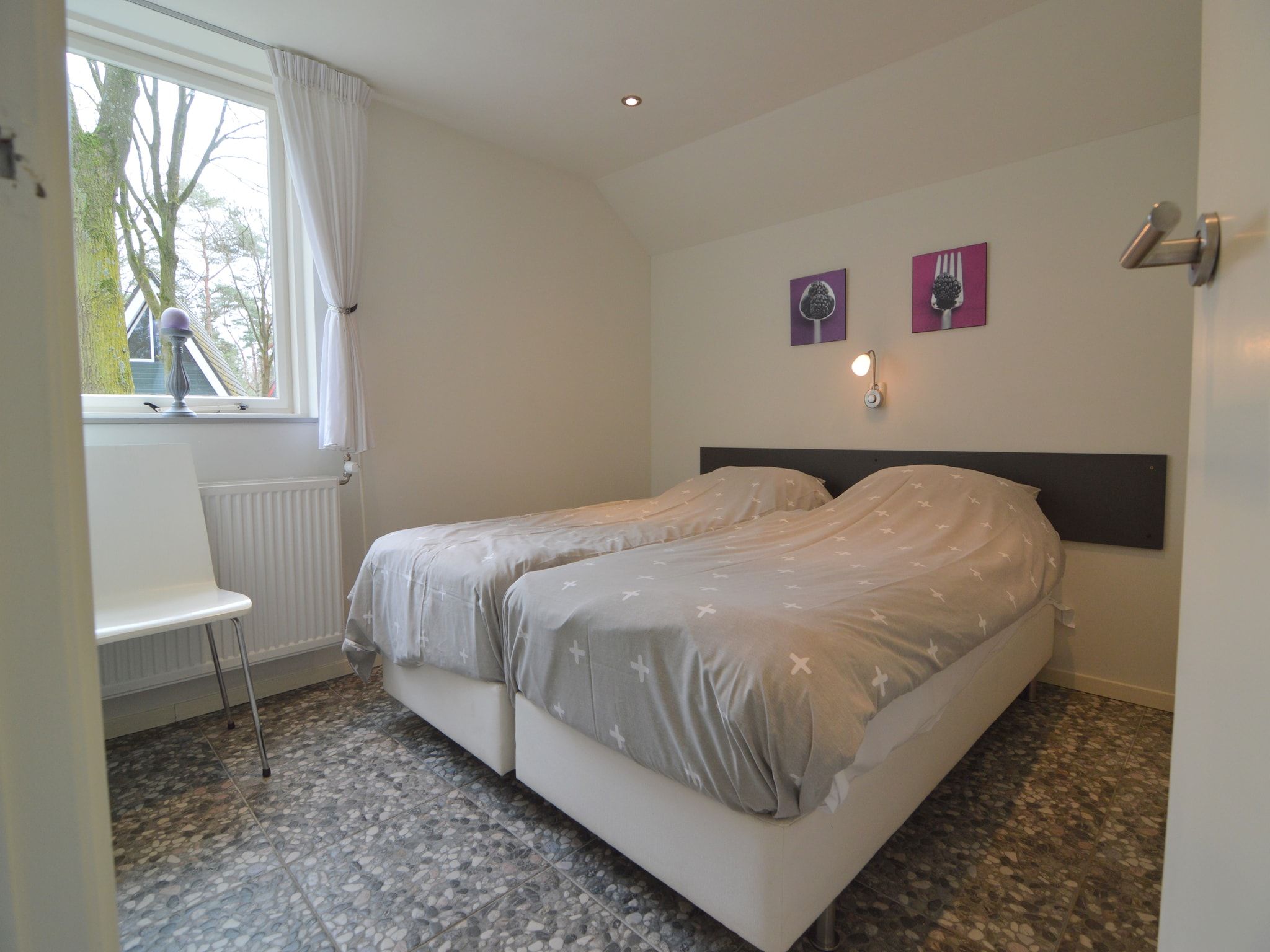 Een slaapkamer van Bungalow nummer 1 in Stramproy