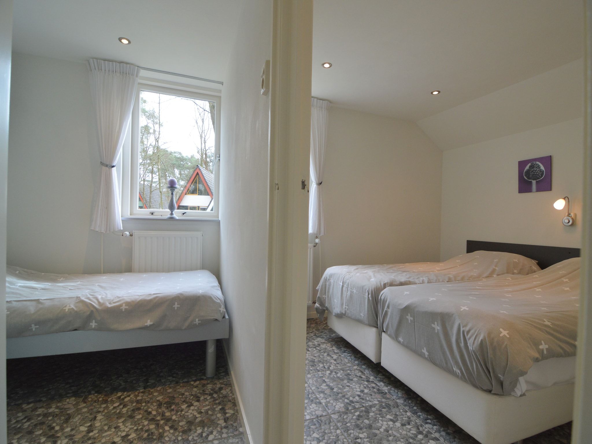 Een slaapkamer van Bungalow nummer 1 in Stramproy