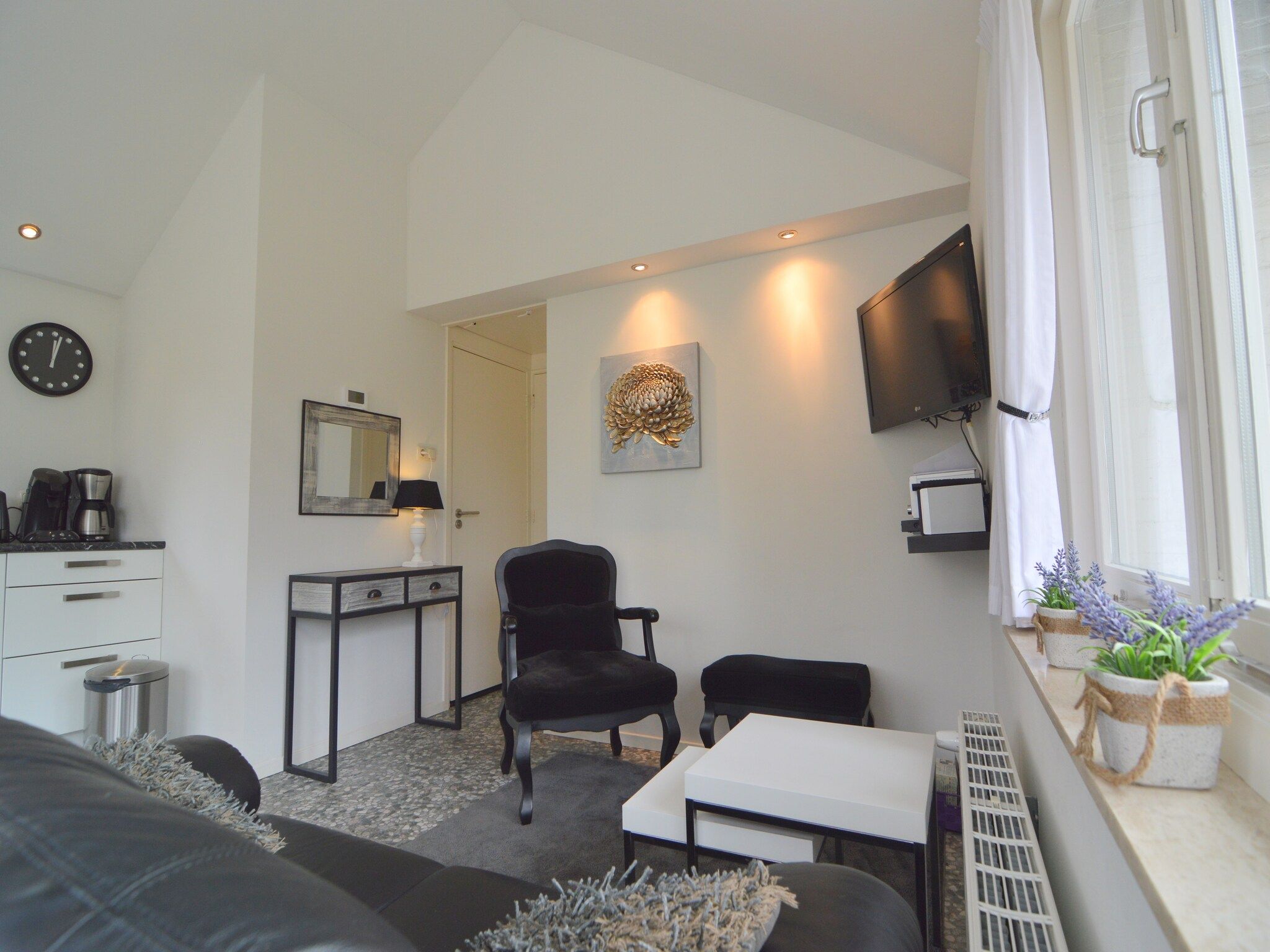 De woonkamer van Bungalow nummer 1 in Stramproy