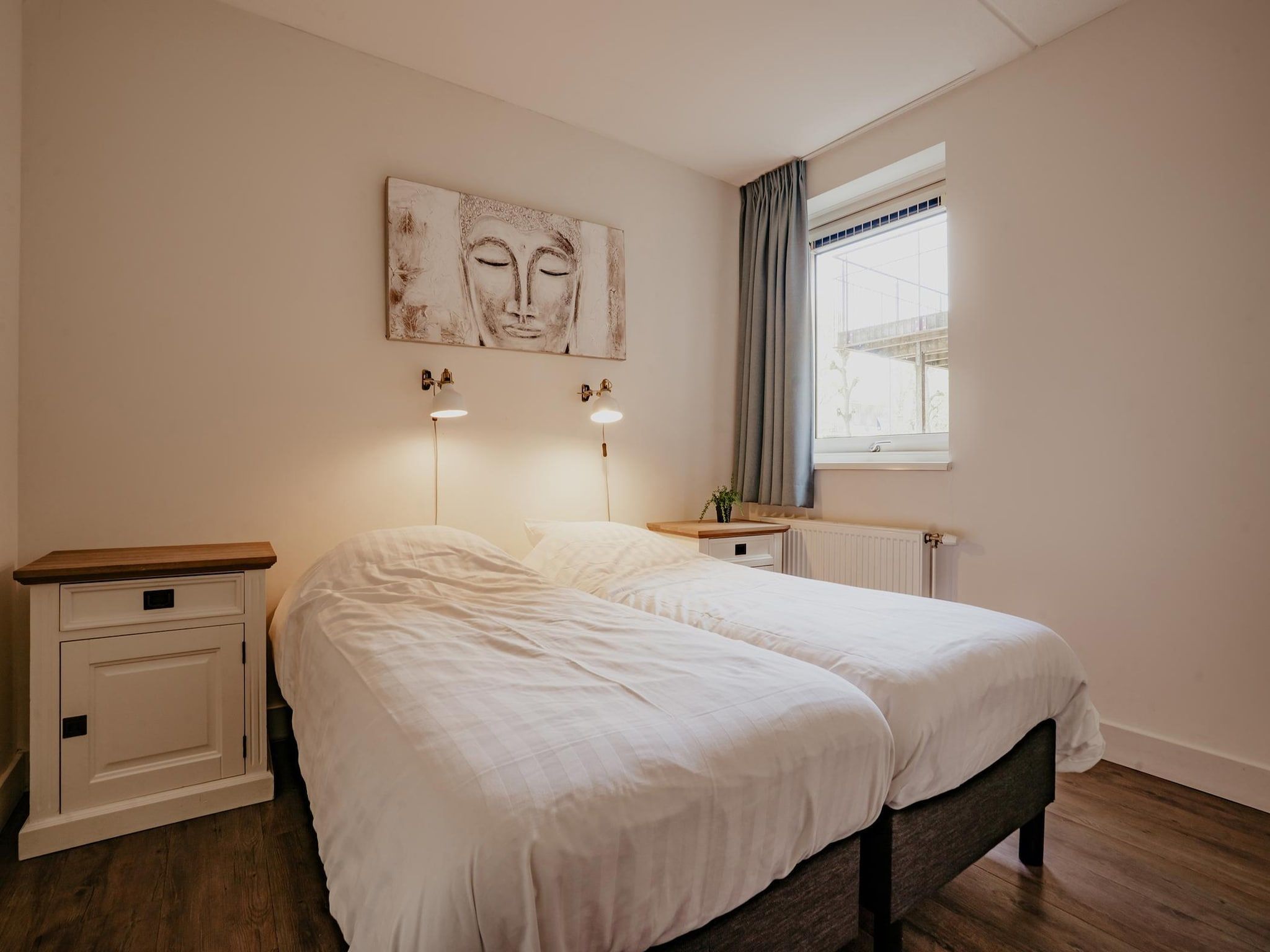 Een slaapkamer van Waterpark de Meerparel  1 in Uitgeest