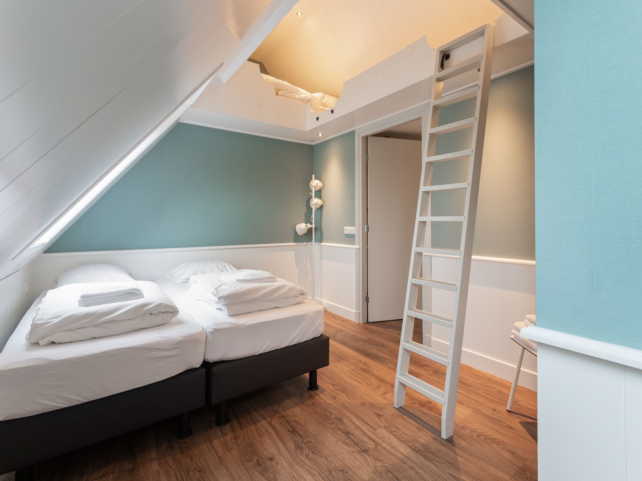 Een slaapkamer van Onder de Molen 10 pers in Middenbeemster