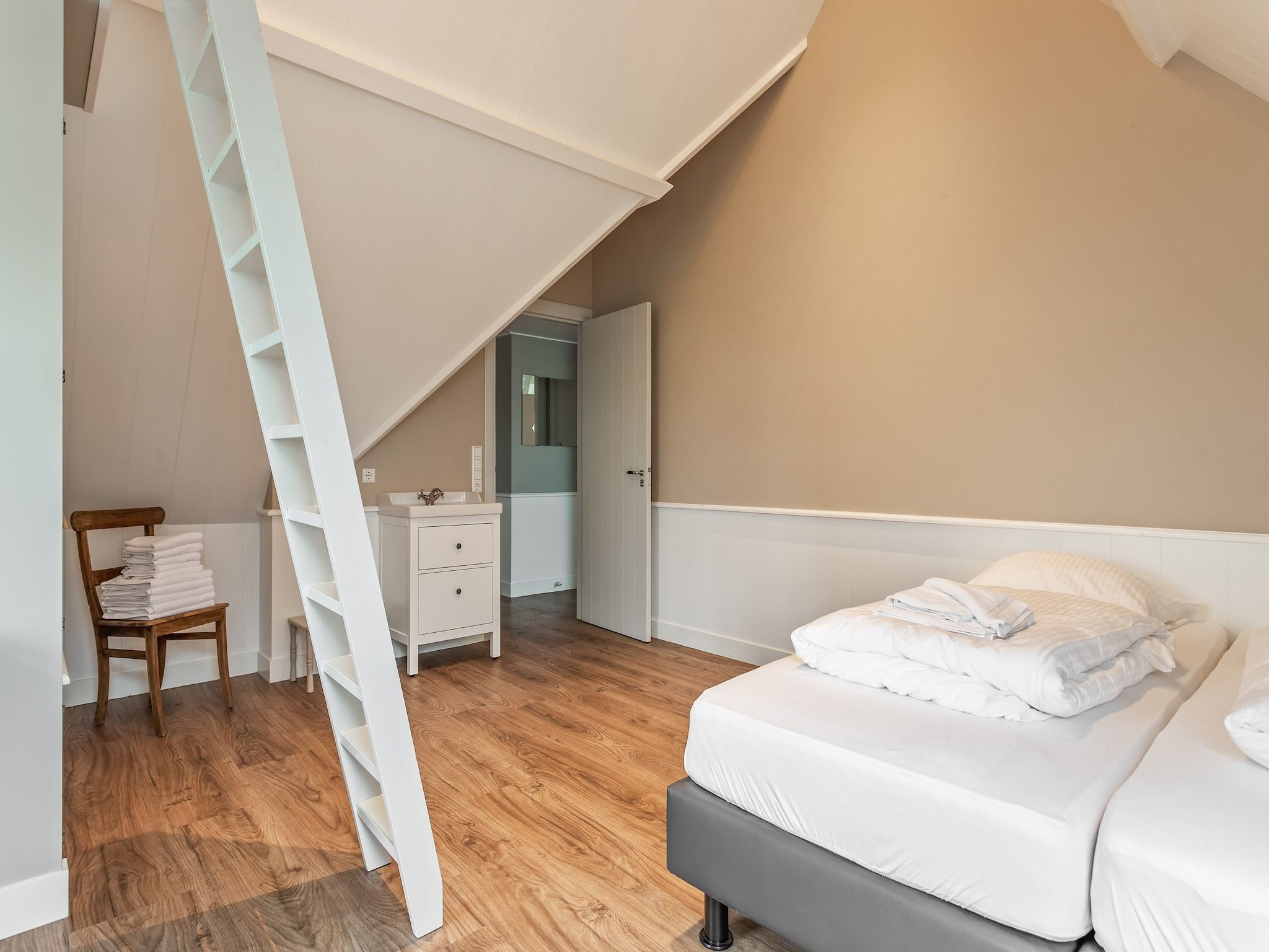 Een slaapkamer van Onder de Molen 10 pers in Middenbeemster