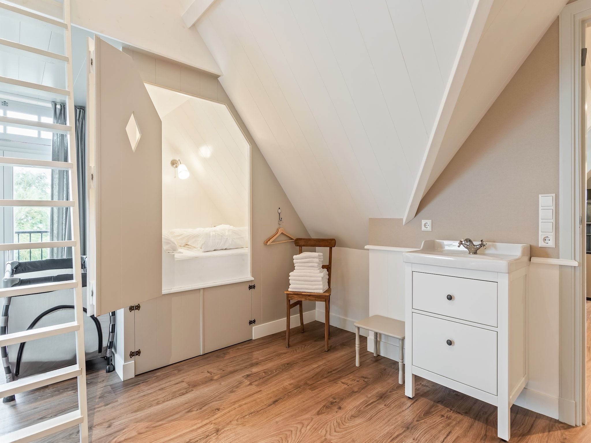 Een slaapkamer van Onder de Molen 10 pers in Middenbeemster