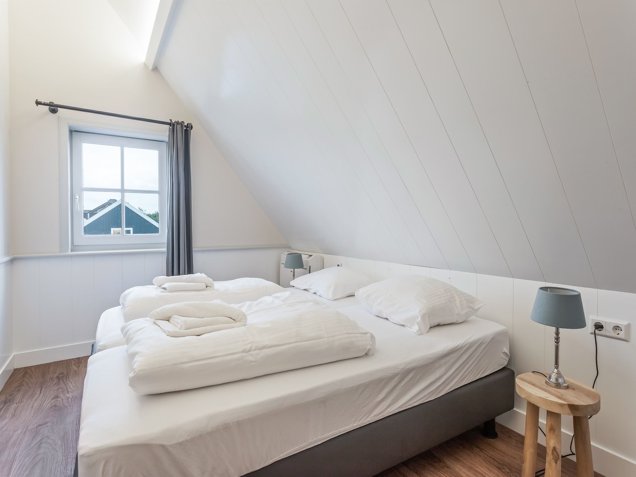 Een slaapkamer van Onder de Molen 10 pers in Middenbeemster