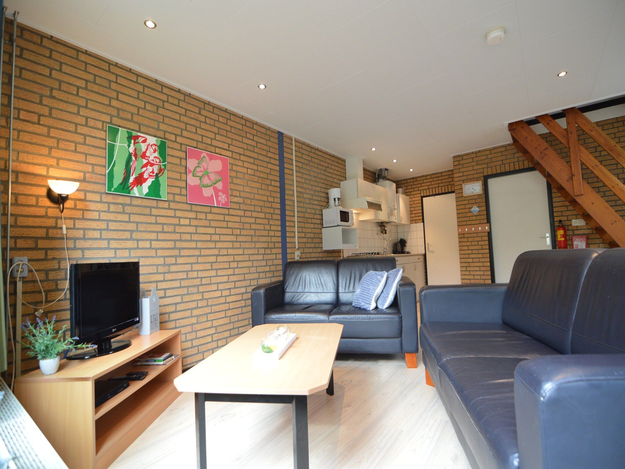 De woonkamer van Bungalow 69 in Stramproy