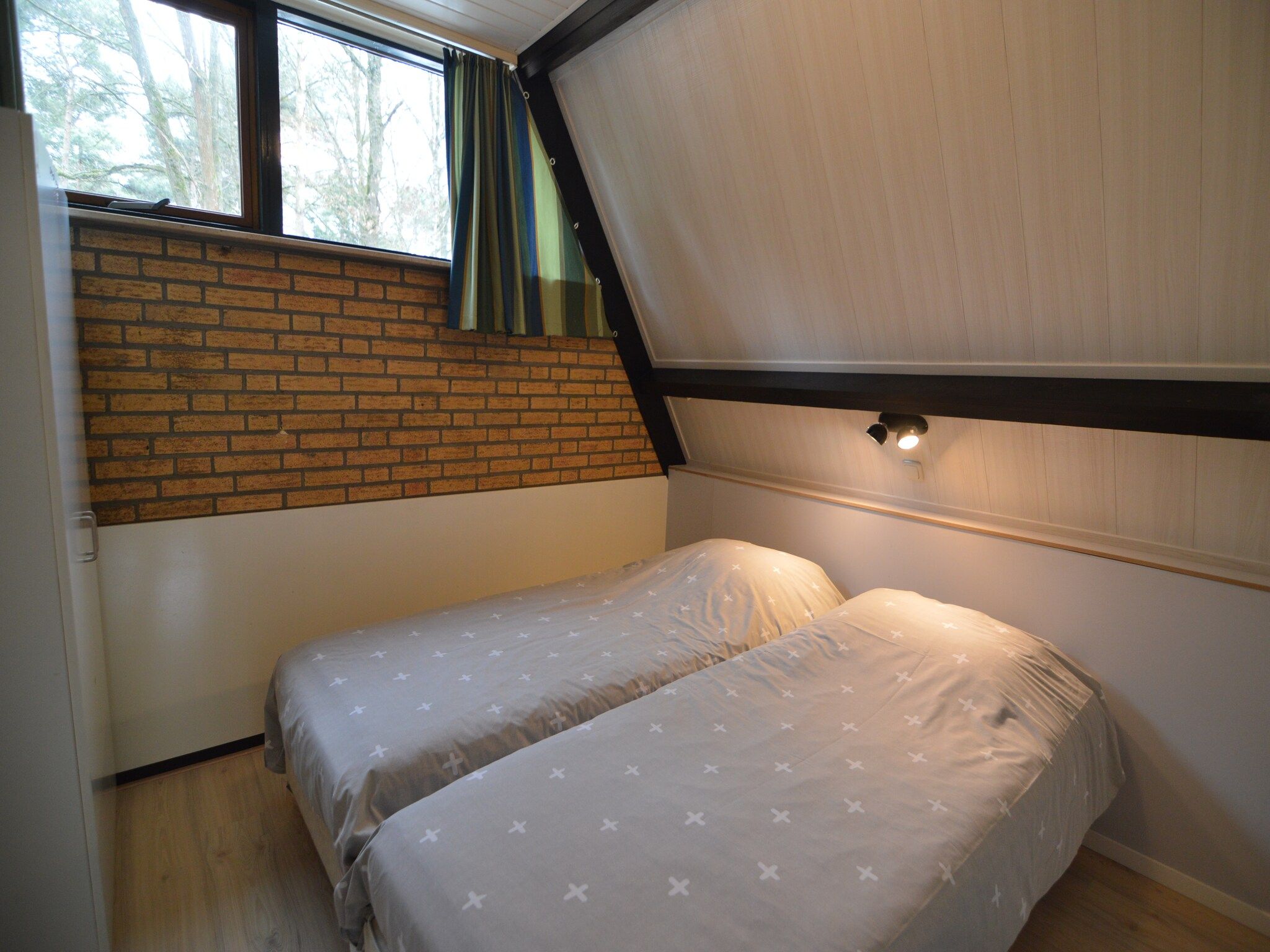 Een slaapkamer van Bungalow 69 in Stramproy