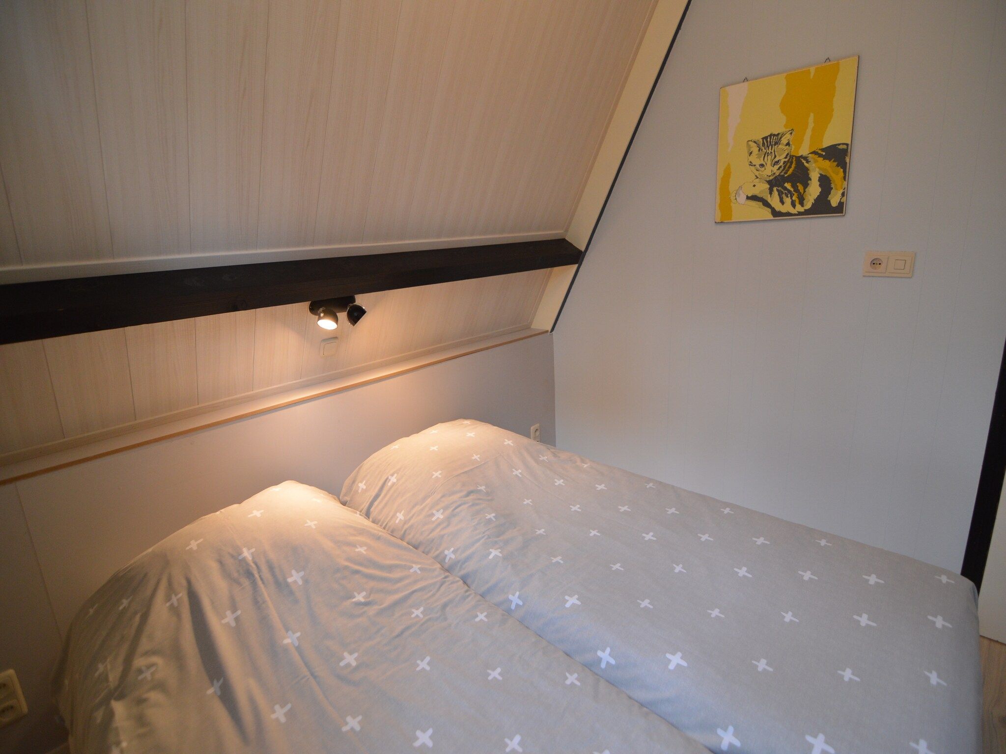 Een slaapkamer van Bungalow 69 in Stramproy