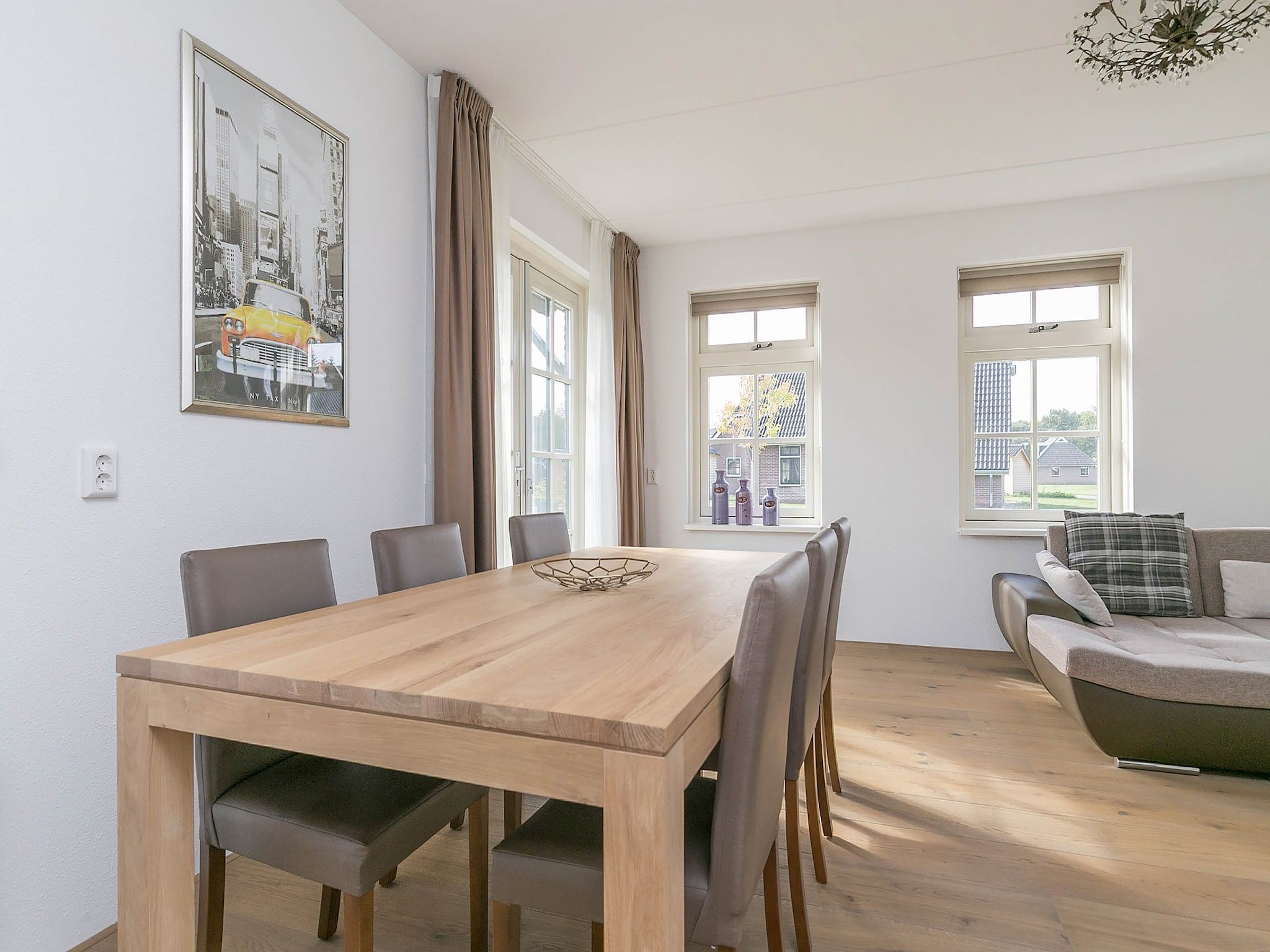 De woonkamer van Villaparc Schoonhovenseland in Hollandscheveld