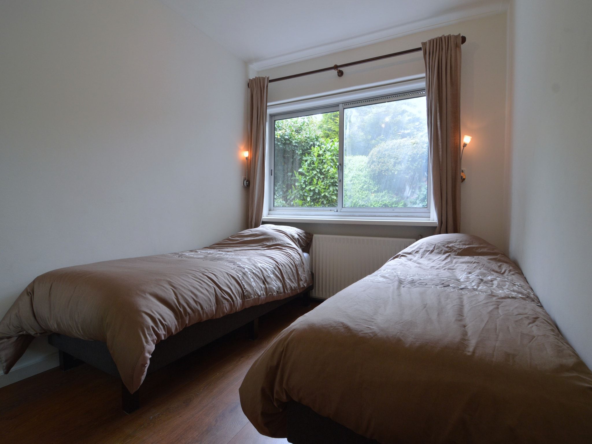 Een slaapkamer van Poort naar de Veluwe in Voorthuizen