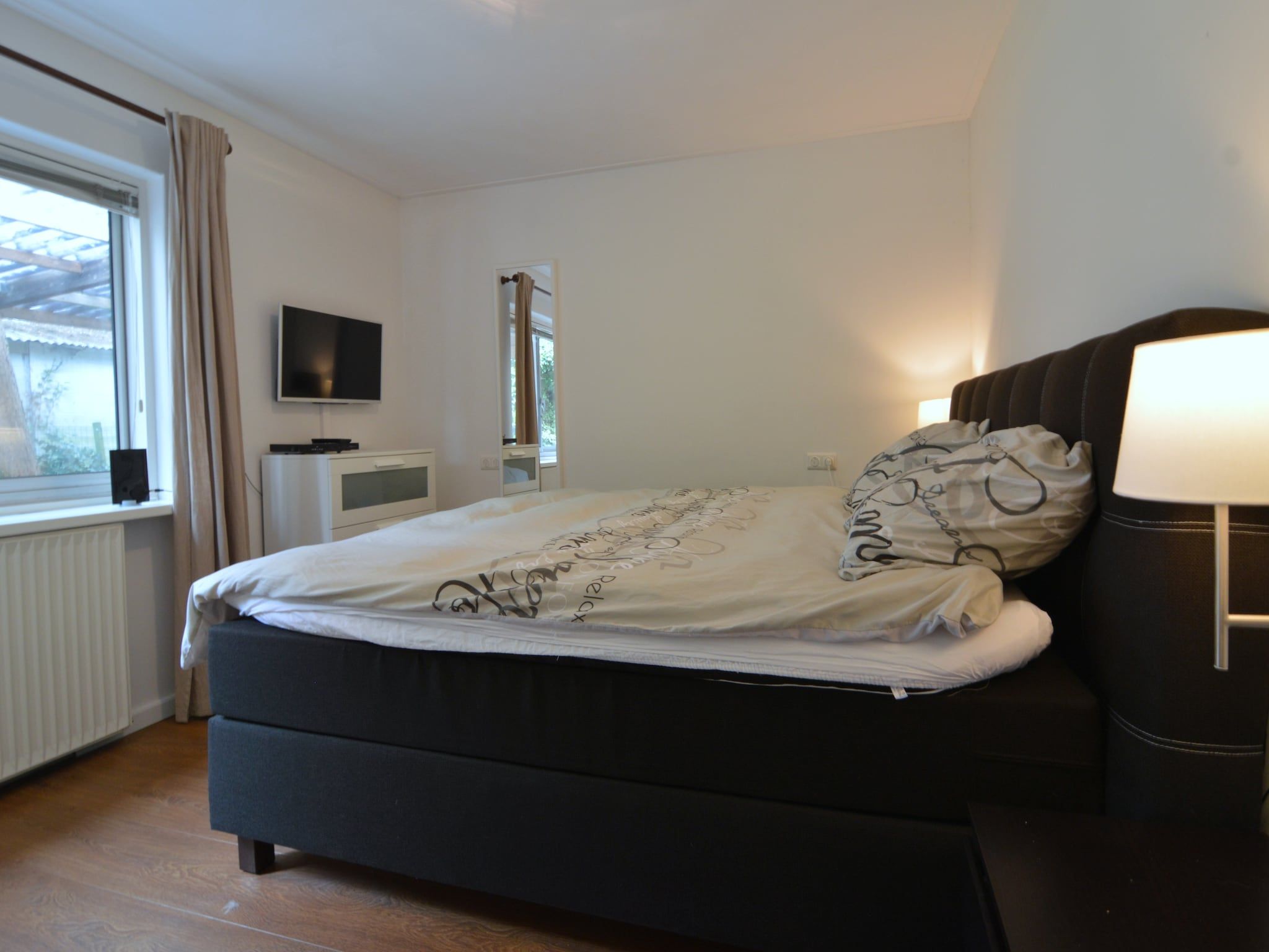 Een slaapkamer van Poort naar de Veluwe in Voorthuizen