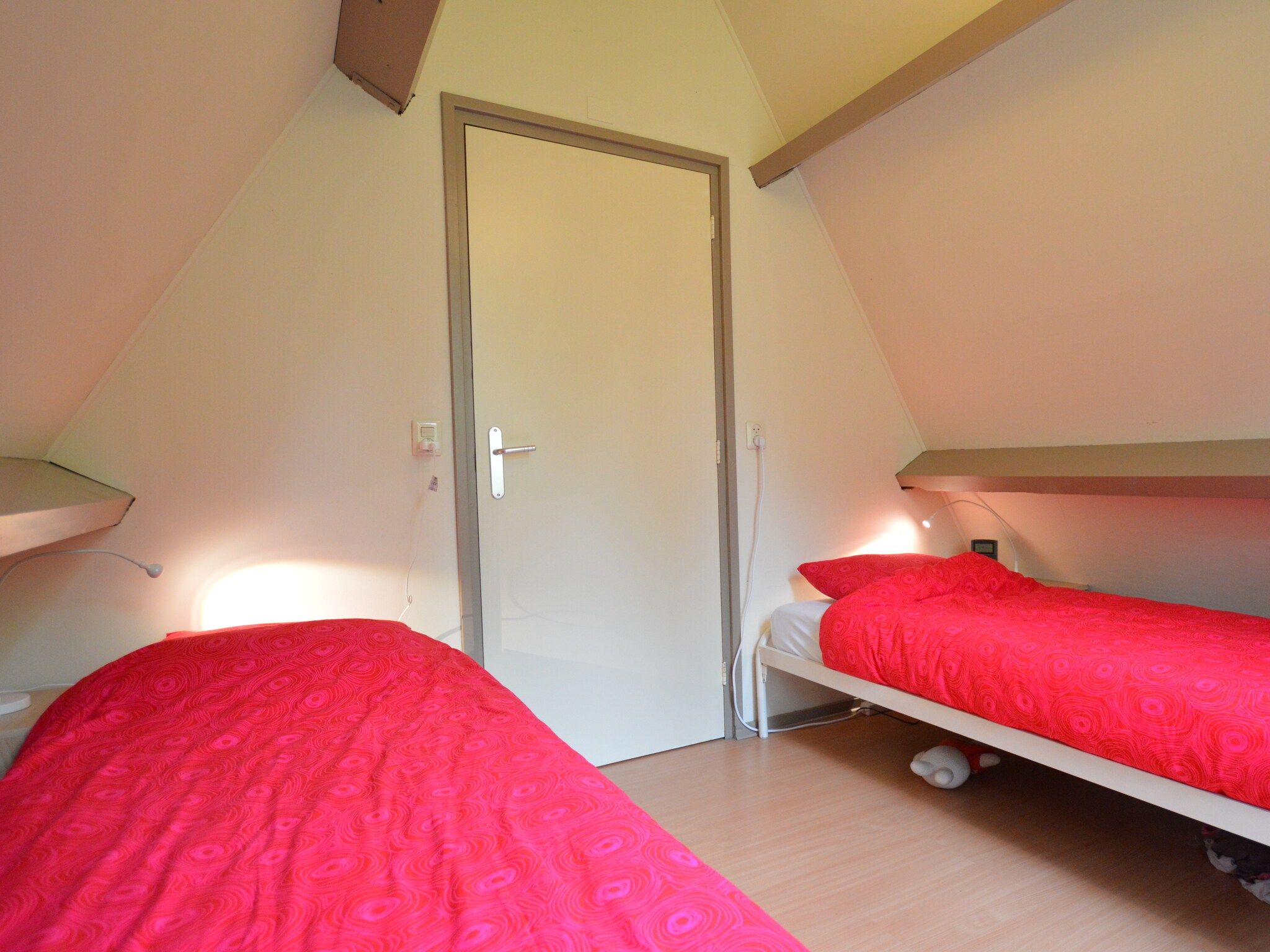 Een slaapkamer van Bungalow 87 in Stramproy