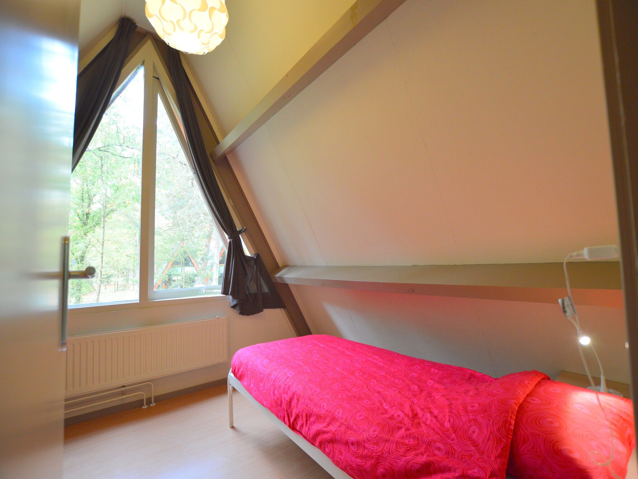 Een slaapkamer van Bungalow 87 in Stramproy