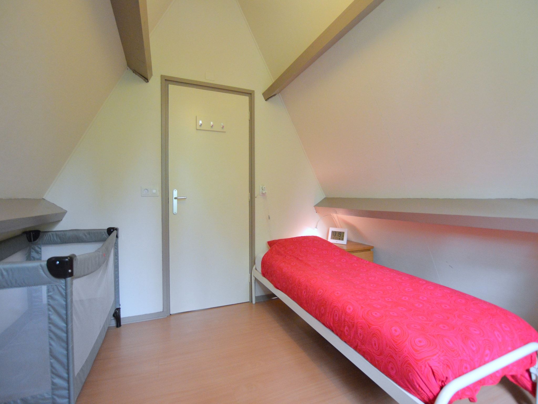 Een slaapkamer van Bungalow 87 in Stramproy