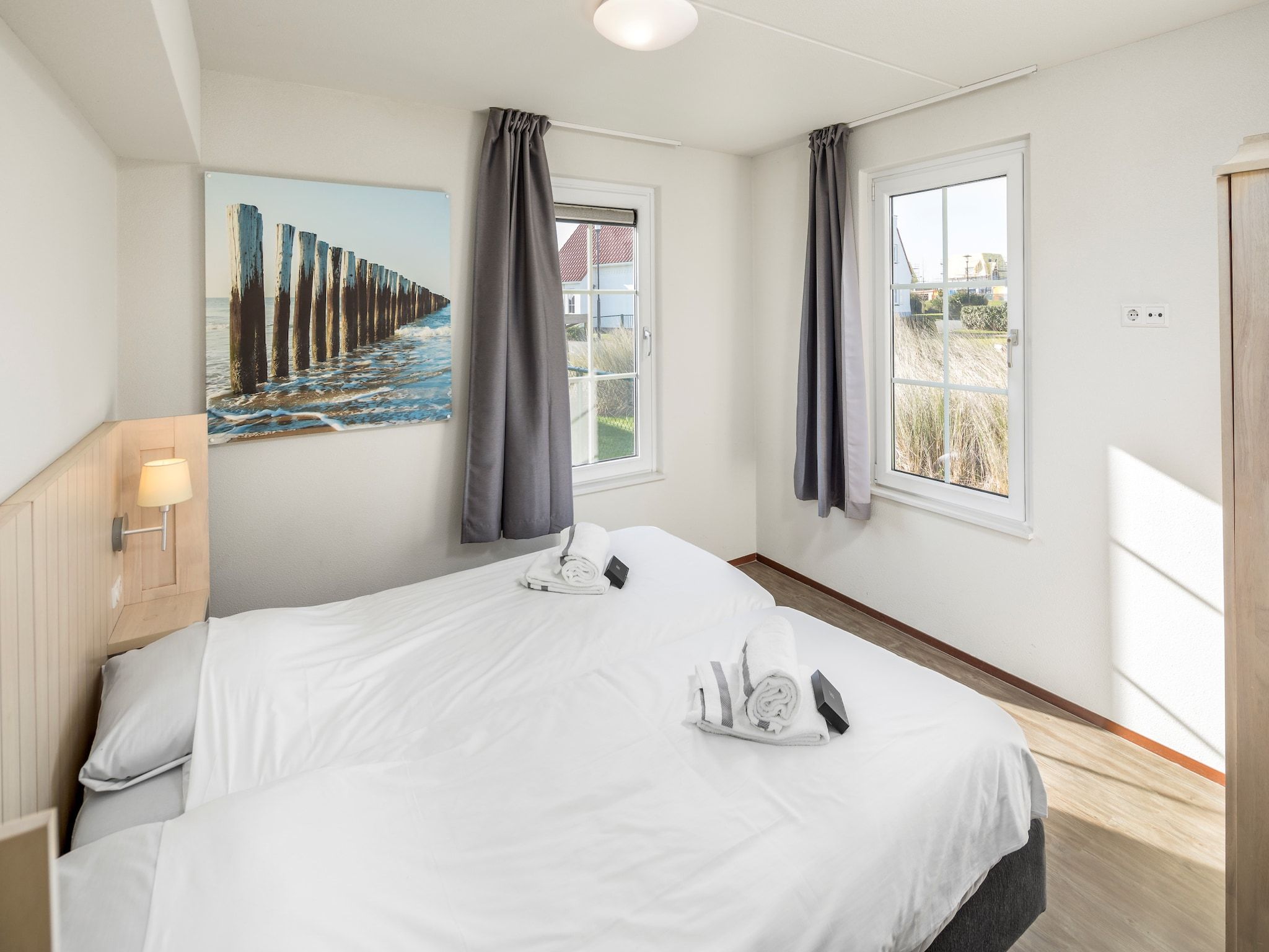 Een slaapkamer van Noordzee Résidence Cadzand-Bad 13 in Cadzand-Bad