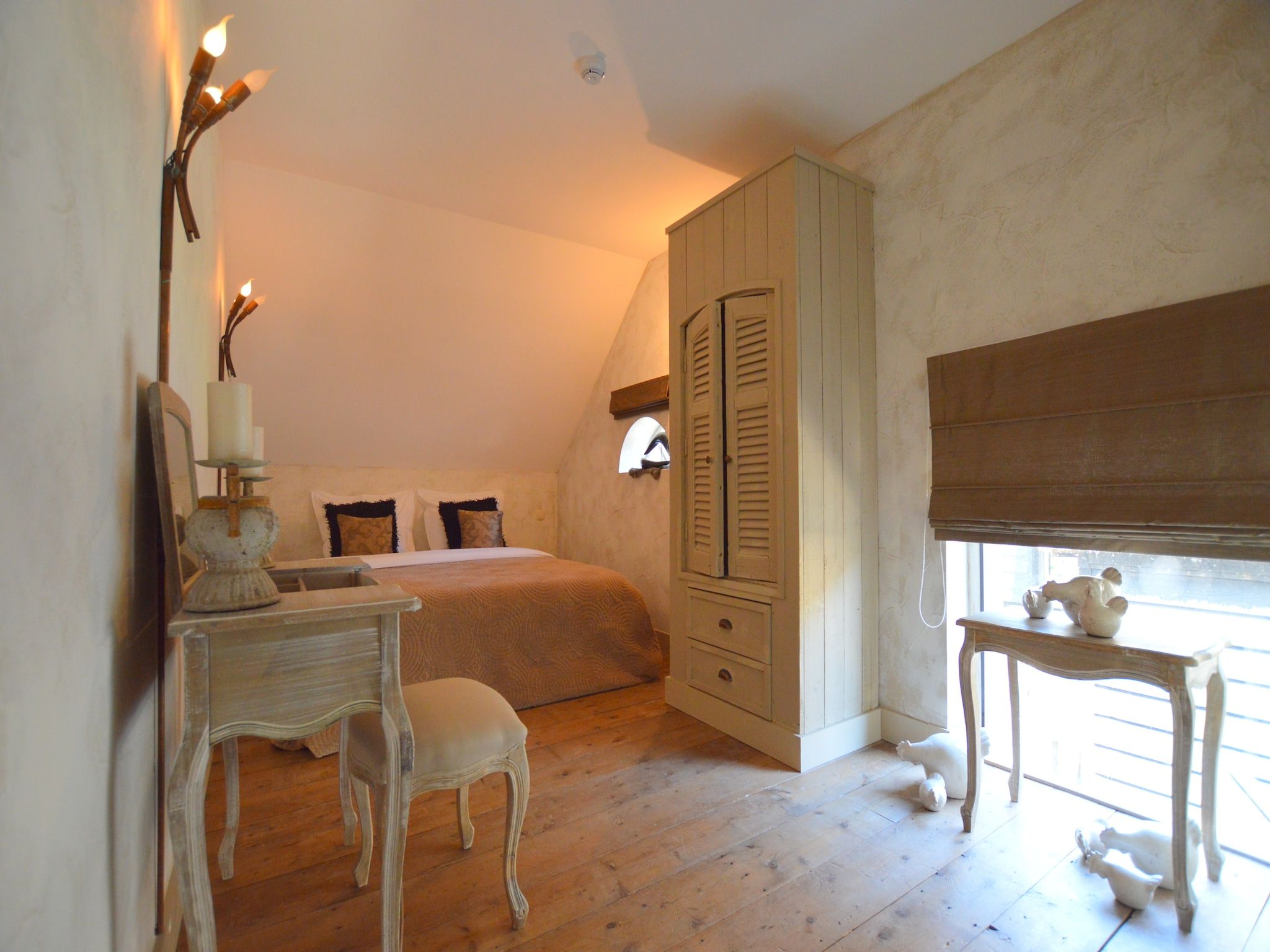 Een slaapkamer van La Grande Maison Douce in Alphen