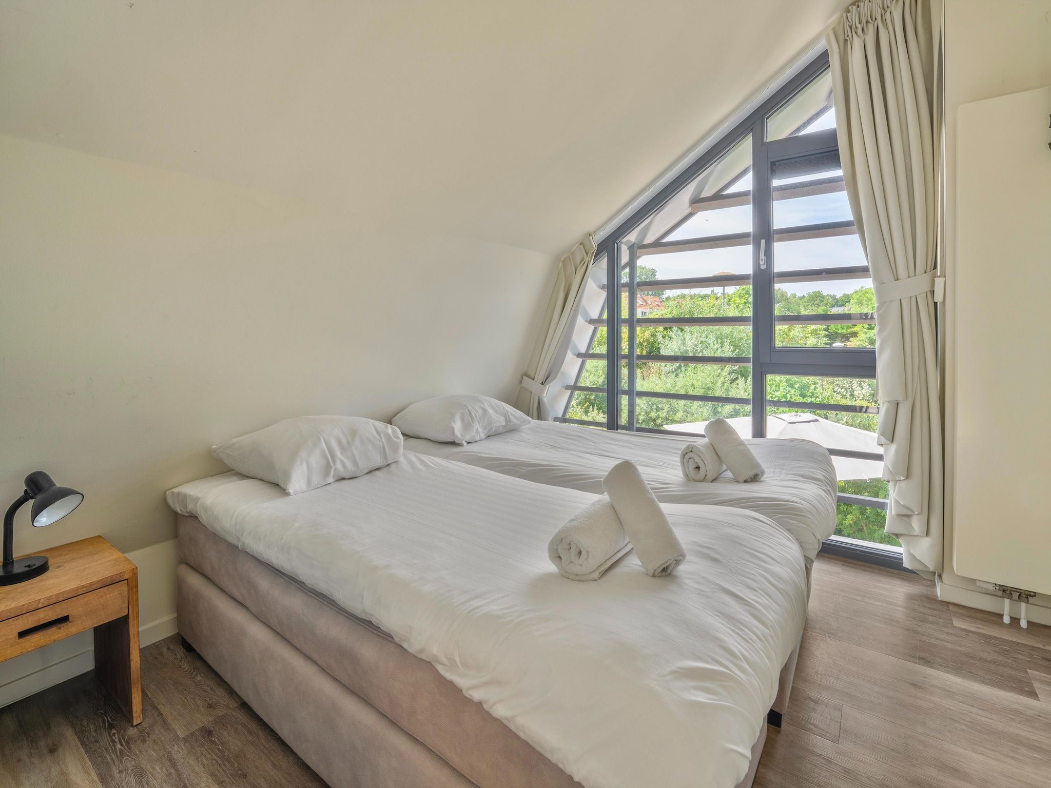 Een slaapkamer van Villa Egmond in Egmond aan den Hoef