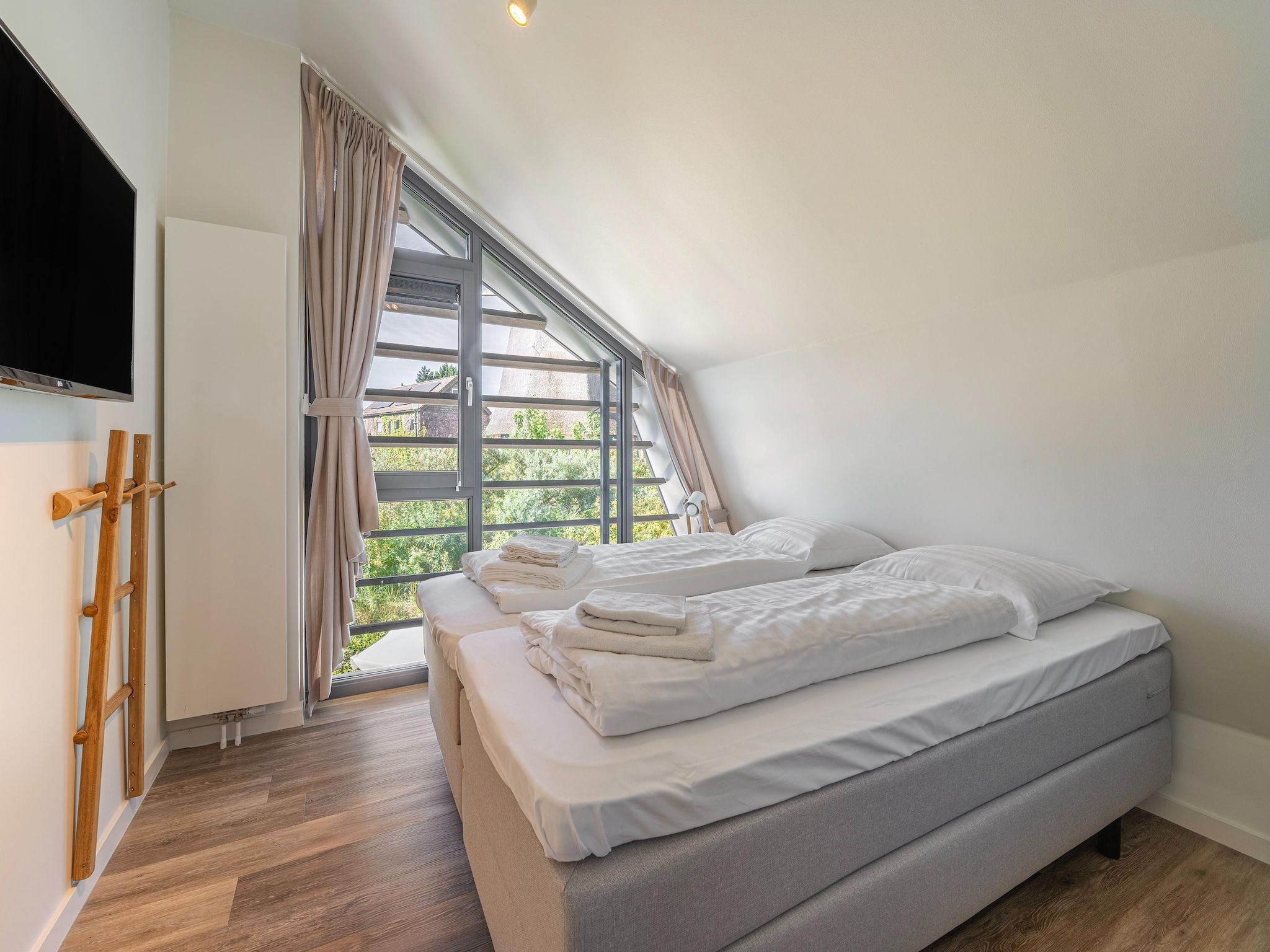 Een slaapkamer van Casa Anti Stressa in Egmond aan den Hoef