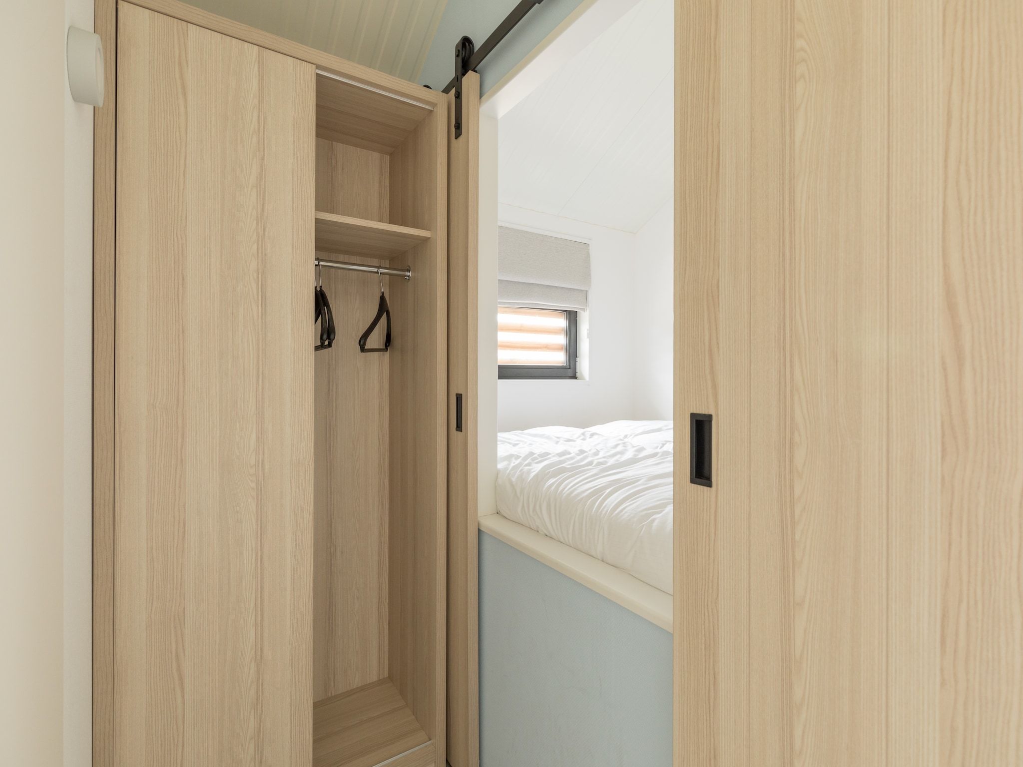 Een slaapkamer van Sea Lodges Ameland 1 in Hollum