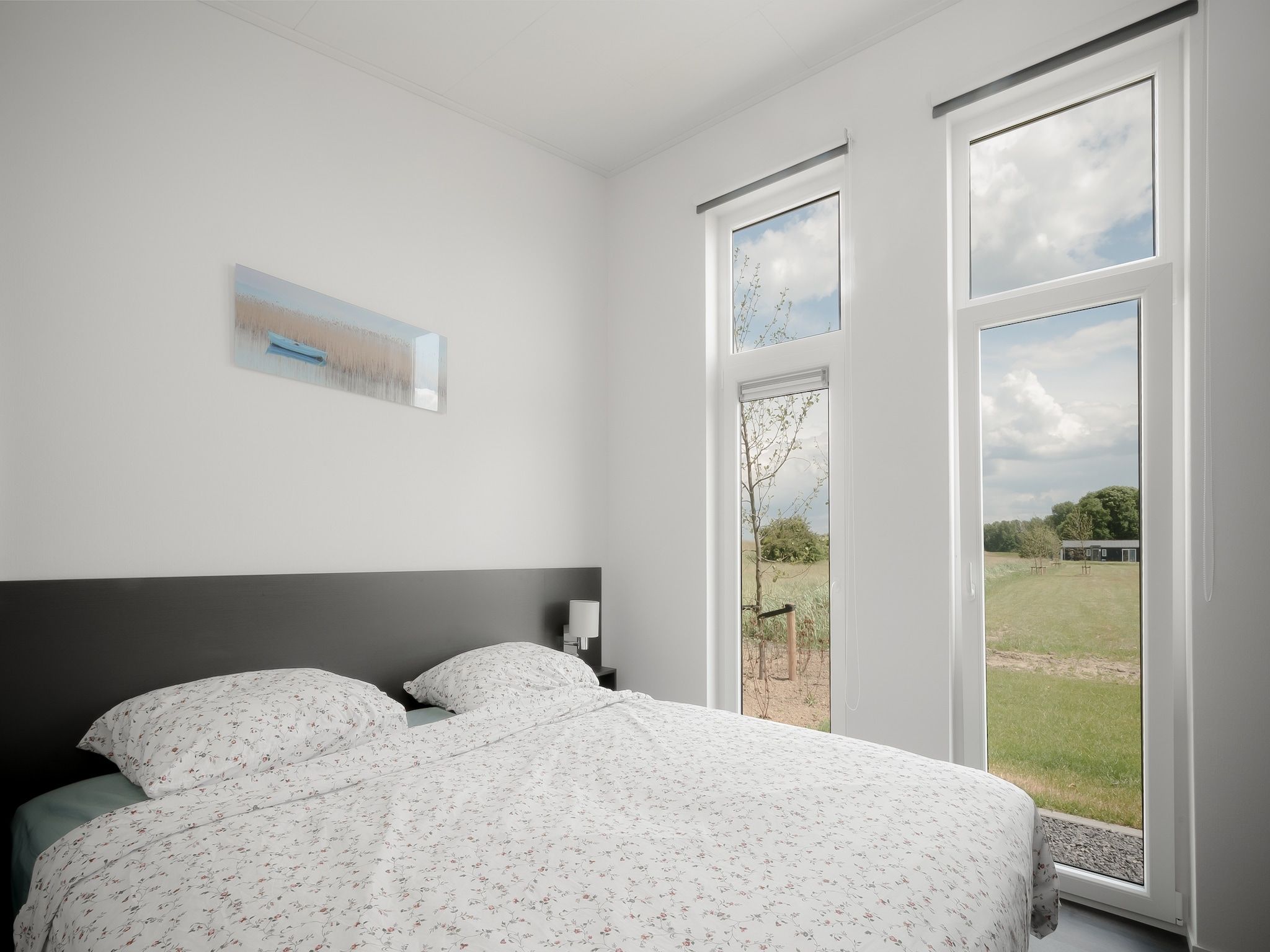 Een slaapkamer van Water Resort Oosterschelde 69 in Wemeldinge