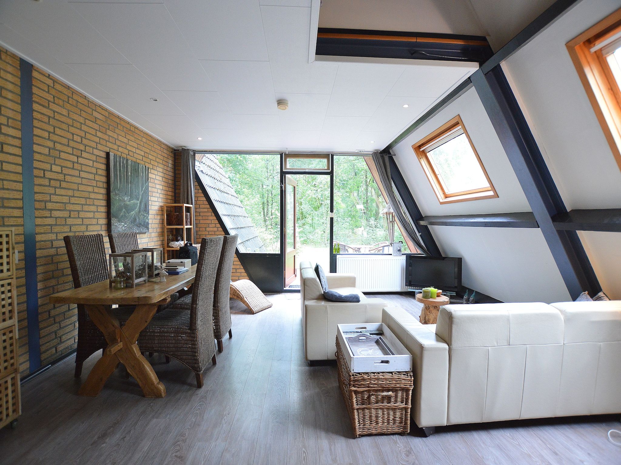 De woonkamer van Bungalow 86 in Stramproy