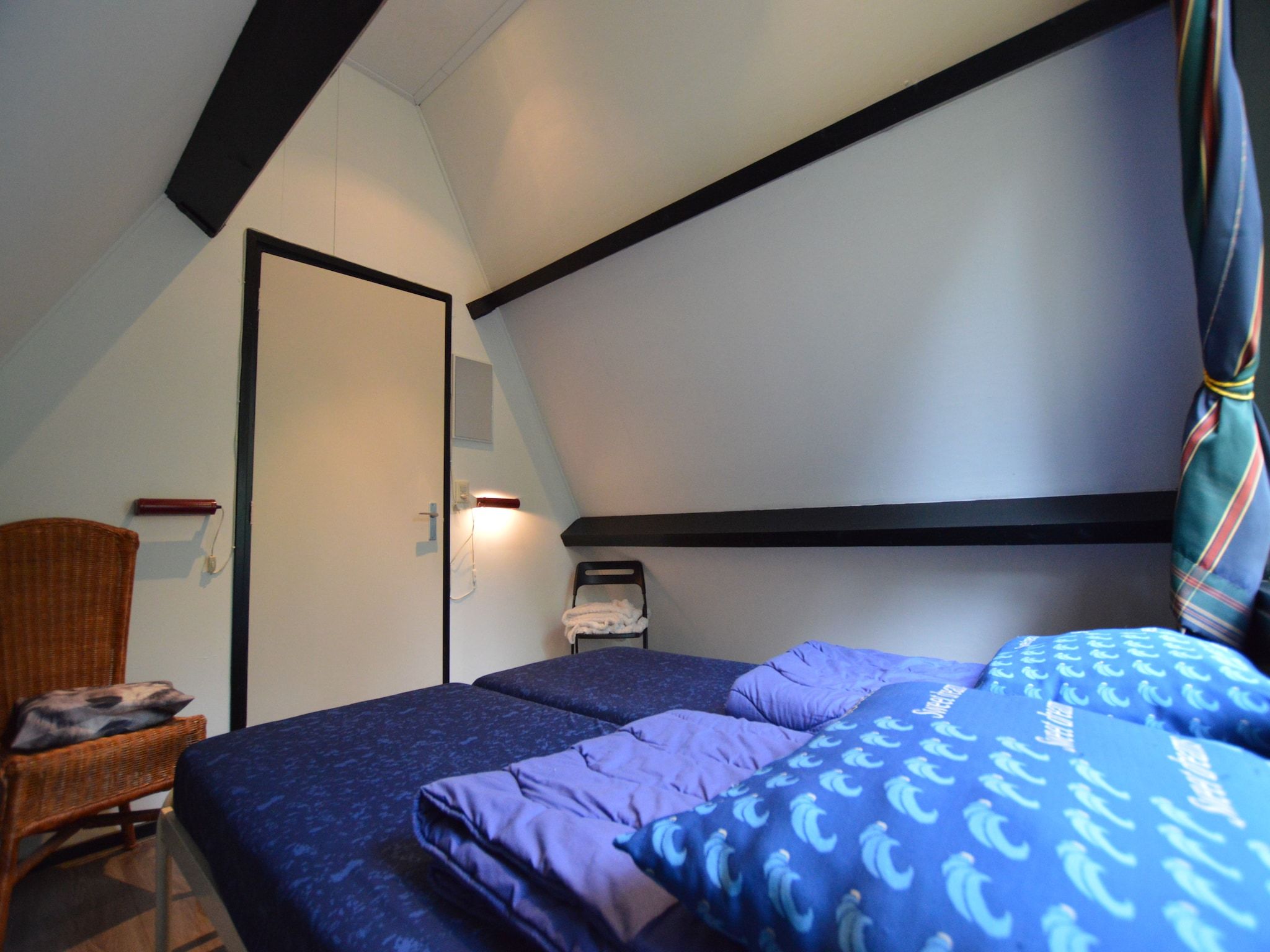 Een slaapkamer van Bungalow 86 in Stramproy