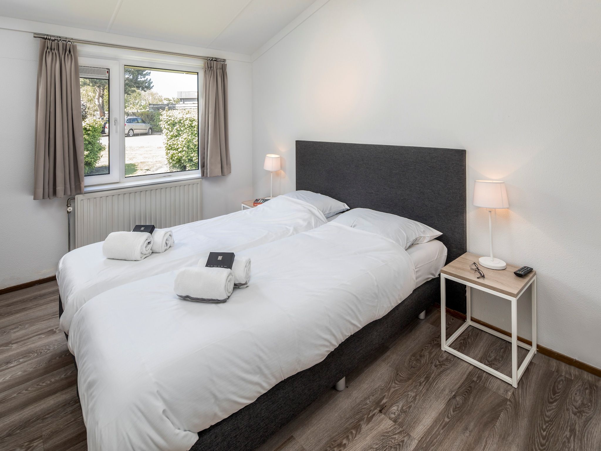 Een slaapkamer van Vakantiepark Hof Domburg 12 in Domburg