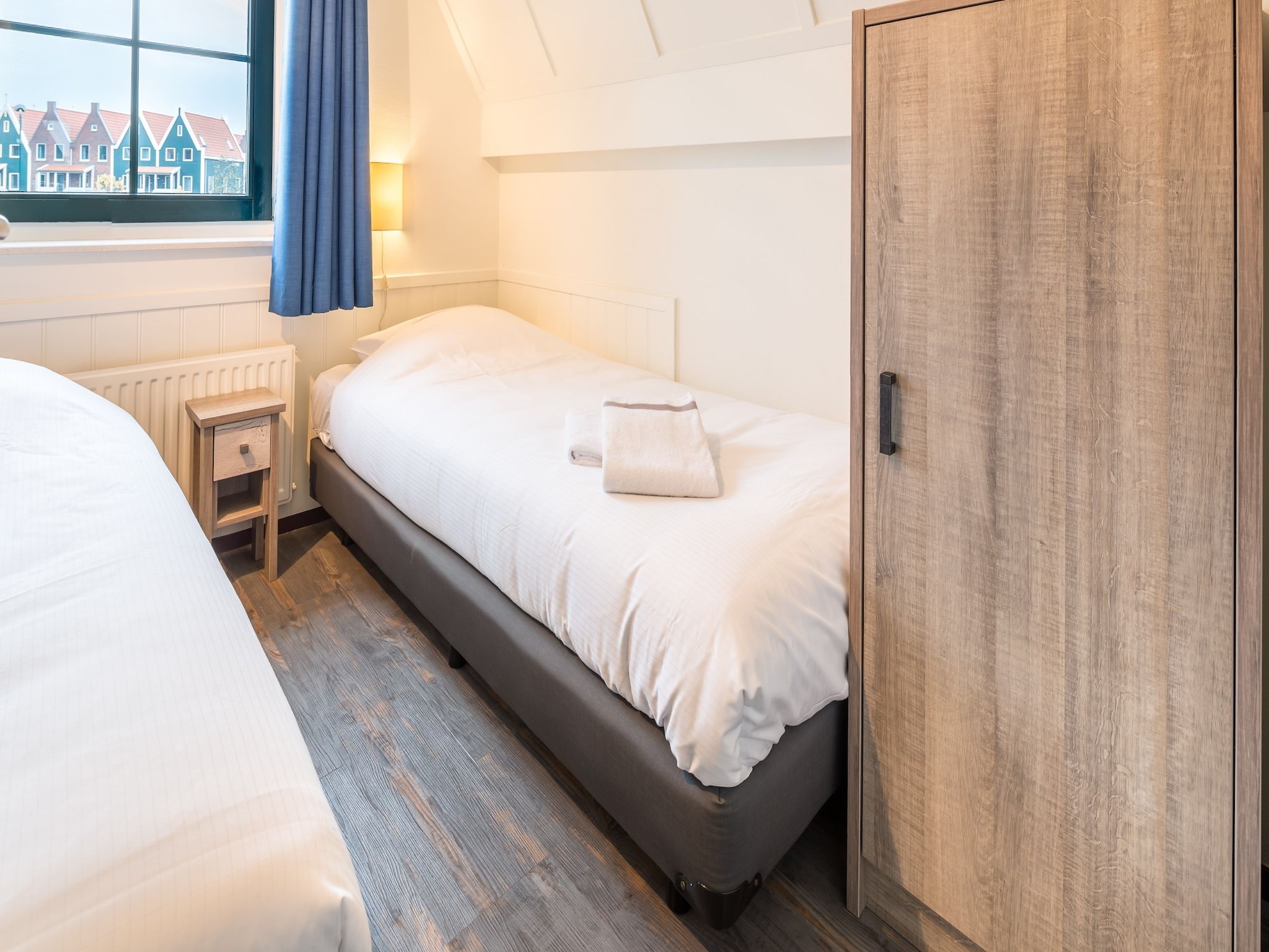 Een slaapkamer van Marinapark Volendam 3 in Volendam