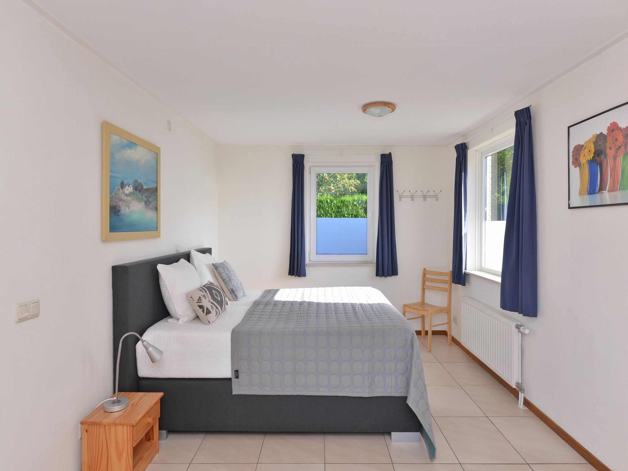 Een slaapkamer van Saturnuslaan 14 in Kamperland