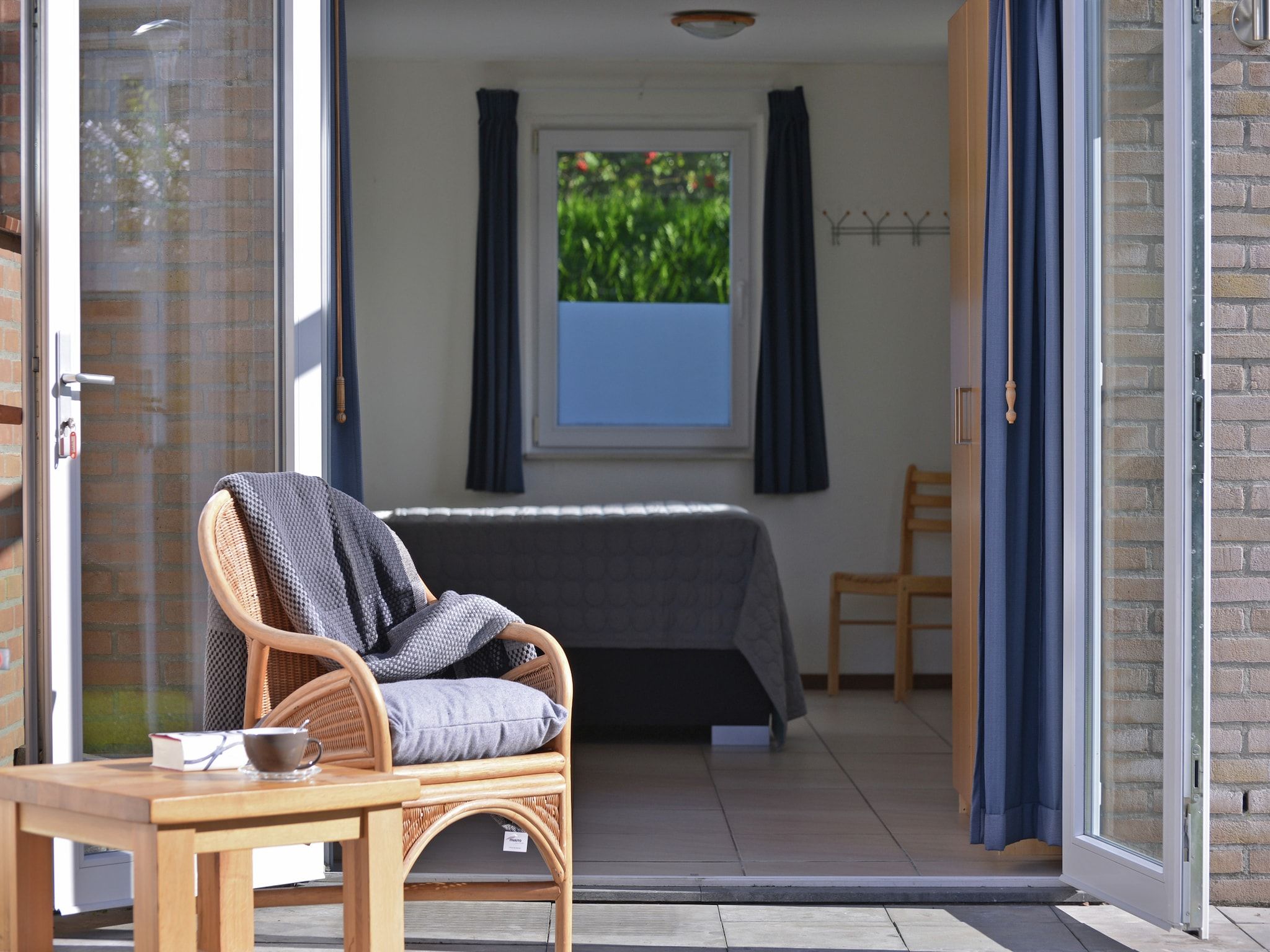 Een slaapkamer van Saturnuslaan 14 in Kamperland