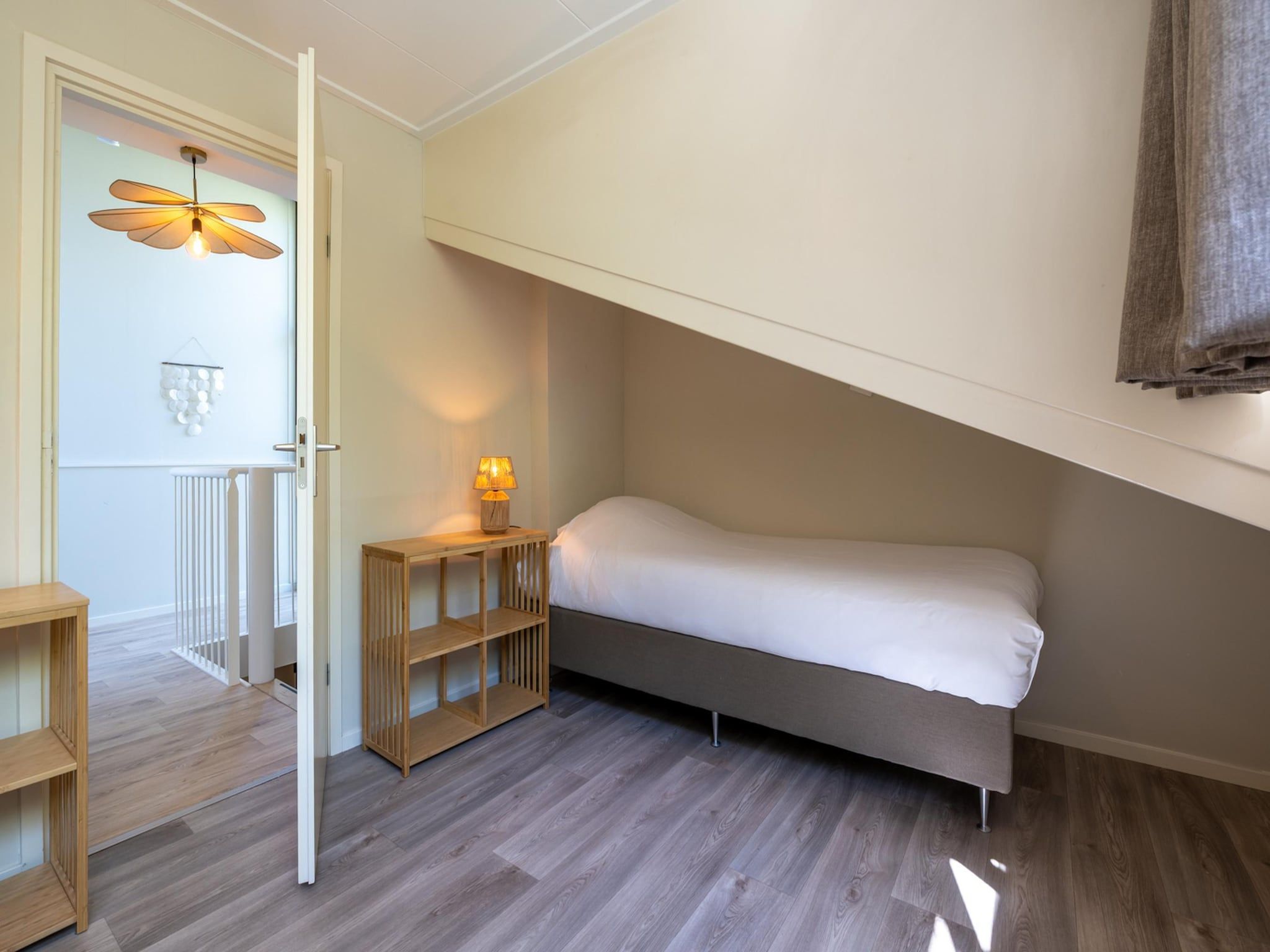 Een slaapkamer van Wilgenlaan 1 in Kamperland