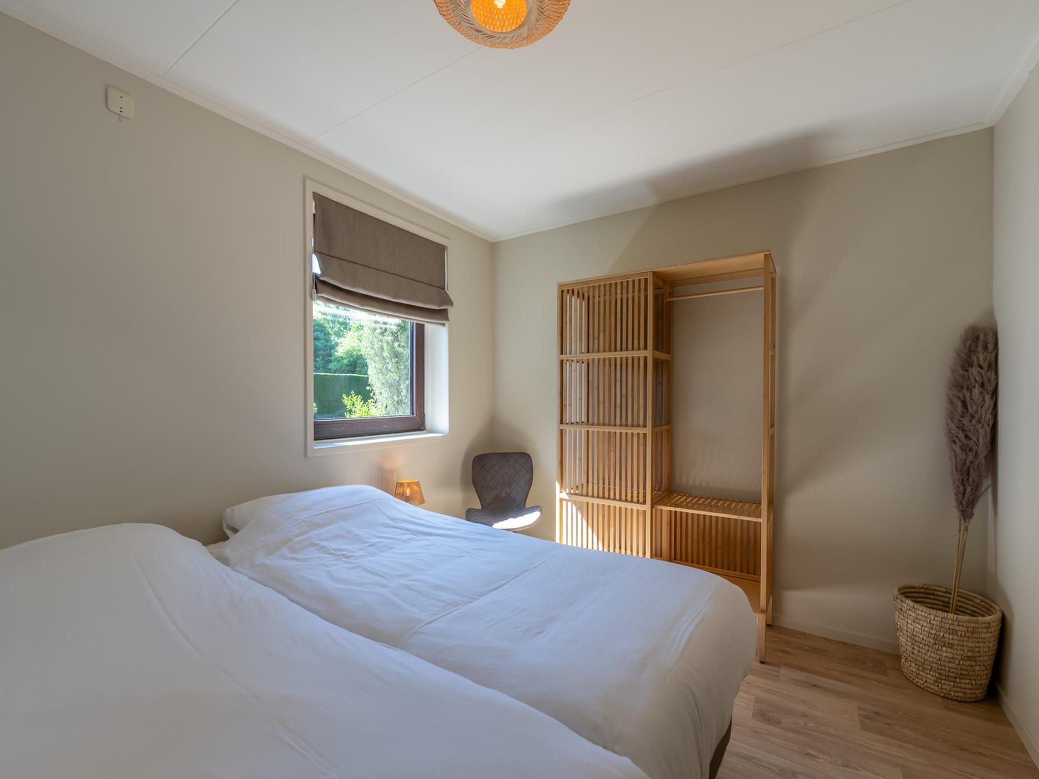 Een slaapkamer van Wilgenlaan 1 in Kamperland