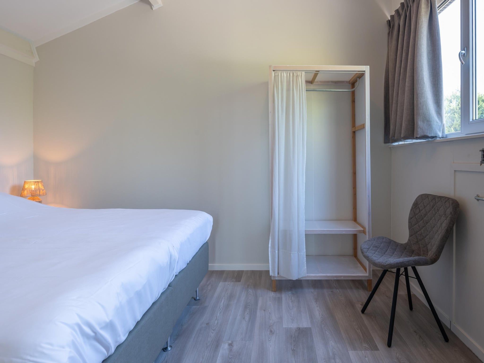 Een slaapkamer van Wilgenlaan 1 in Kamperland