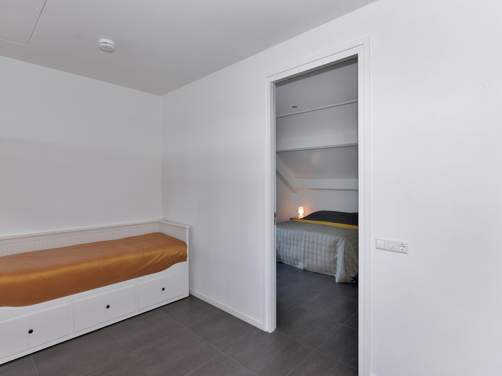 Een slaapkamer van Penthouse XXL 4ab in Kamperland