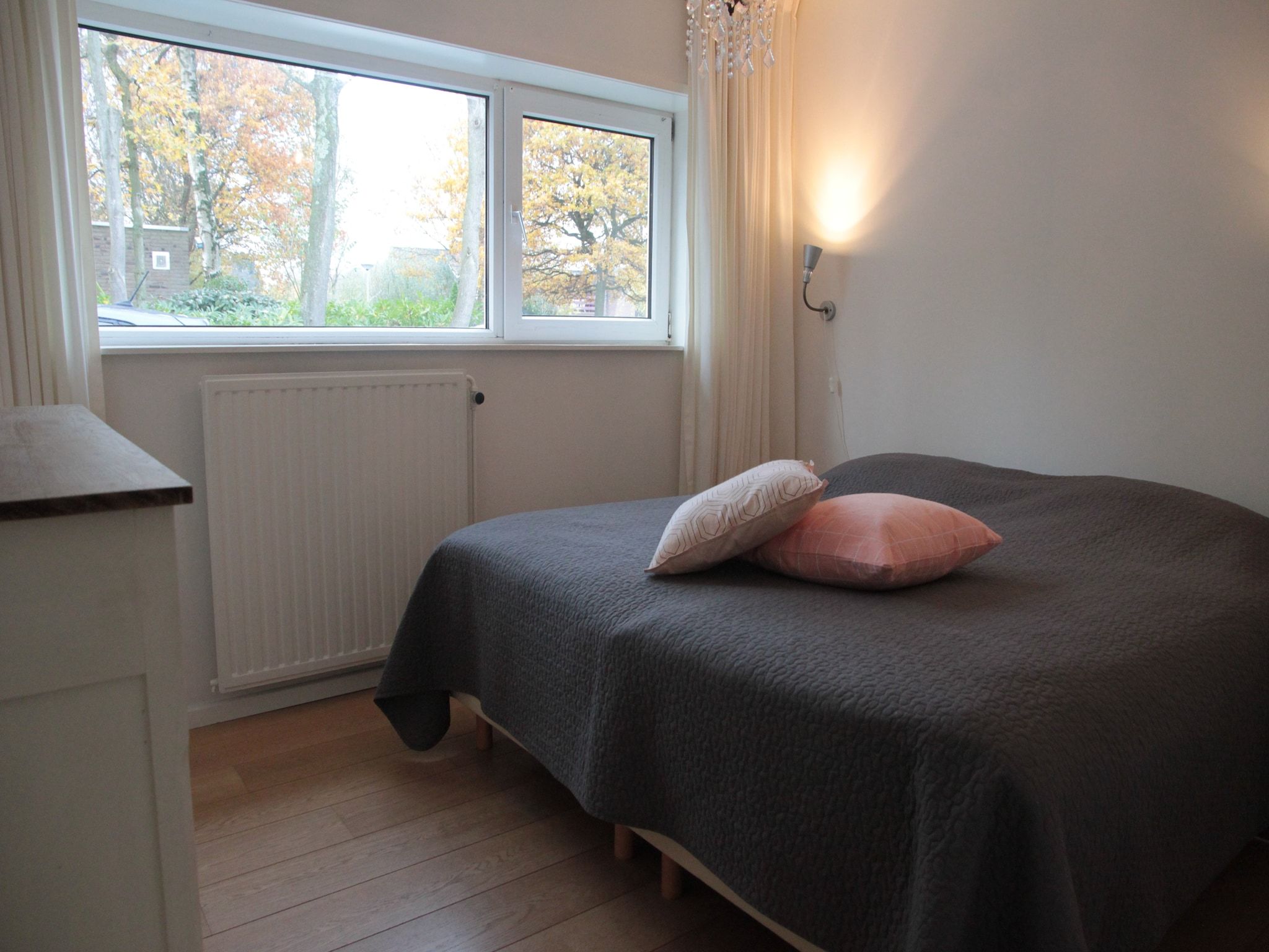 Een slaapkamer van Zwanenlaan 13 in Kamperland